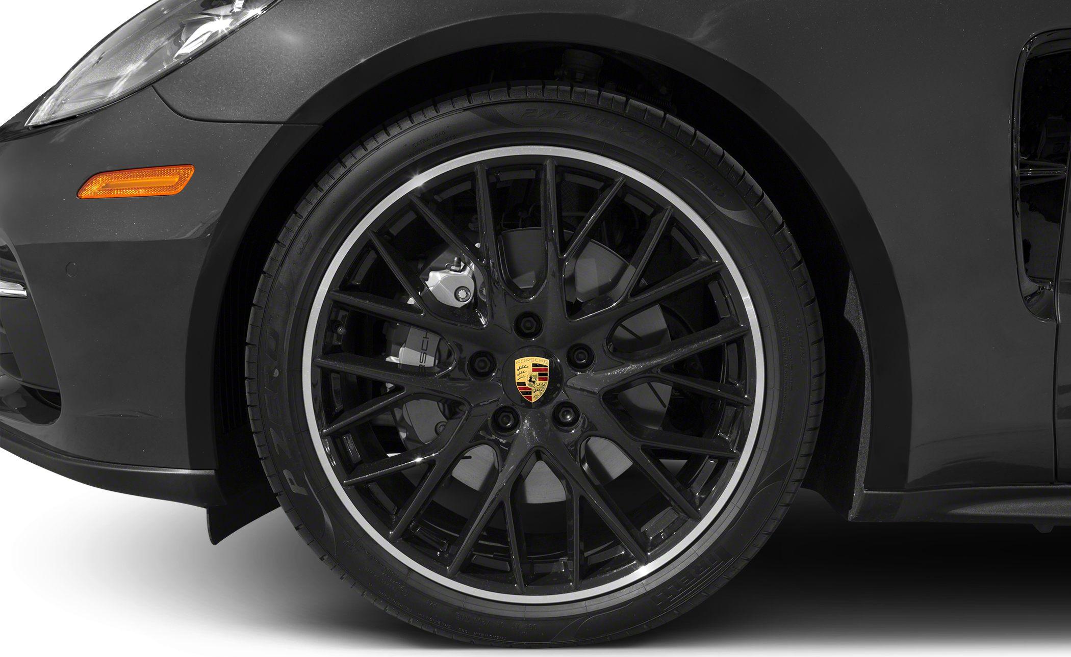 Black multi-spoke alloy wheel with visible braking system
