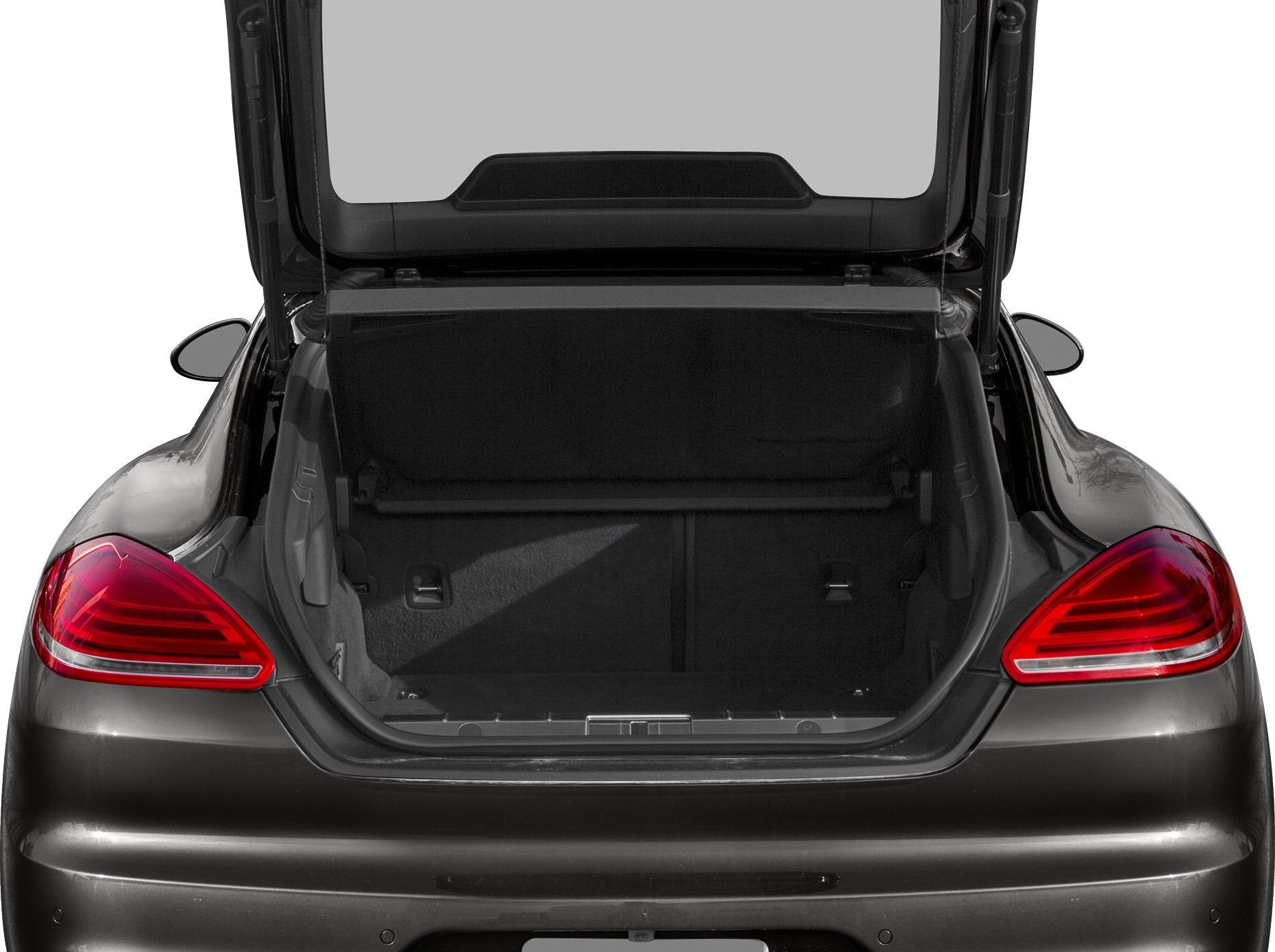 Open hatchback trunk with spacious cargo area and illuminated taillights