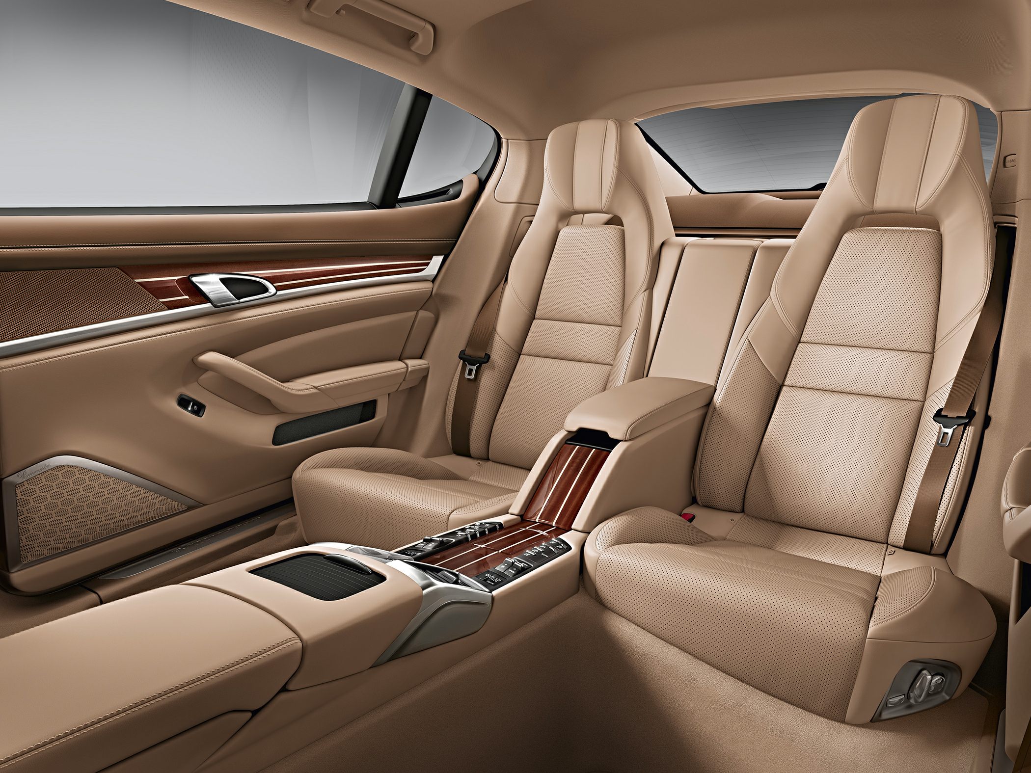 Beige leather rear seats with wood trim center console and built-in controls.