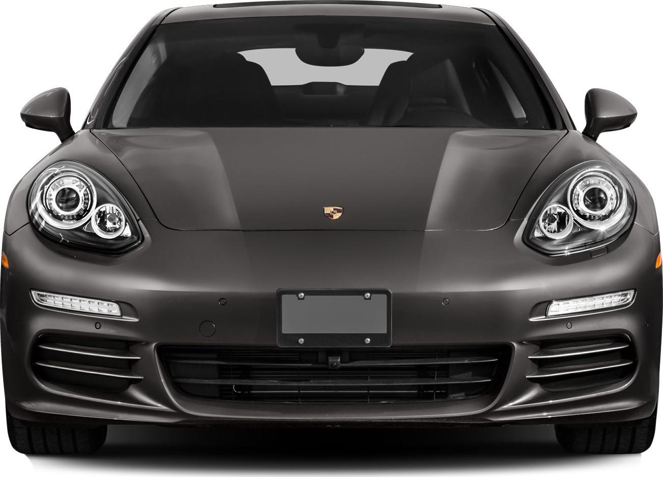Front view with round headlights and sleek hood.