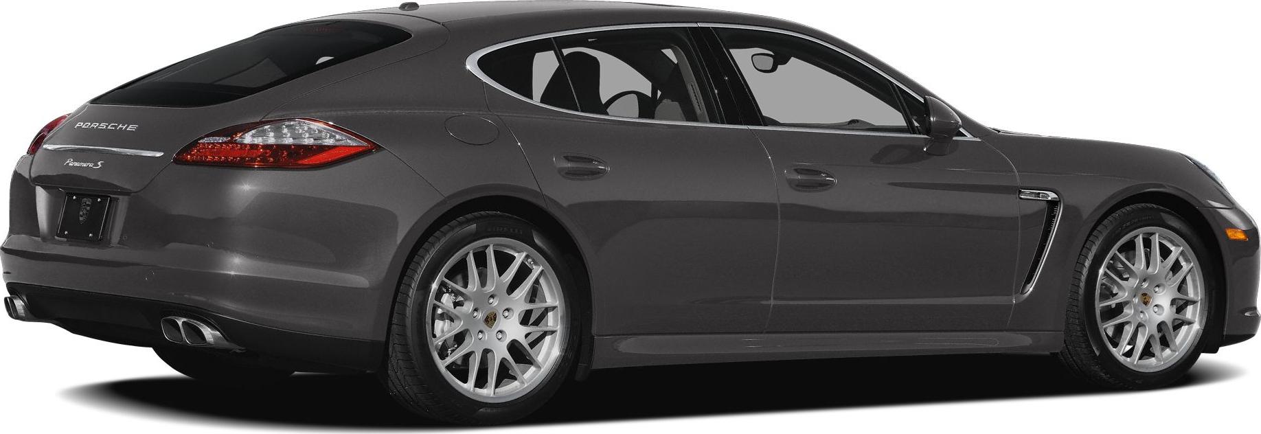 Rear side profile with alloy wheels and dual exhaust