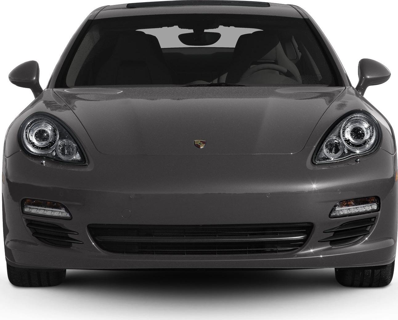 Front view featuring distinctive oval headlights and sleek grille design