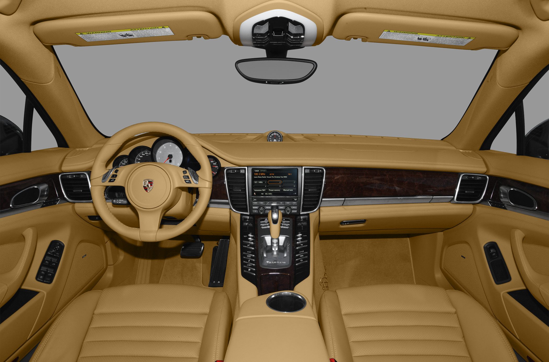 Luxurious steering wheel and dashboard with center console and wood trim