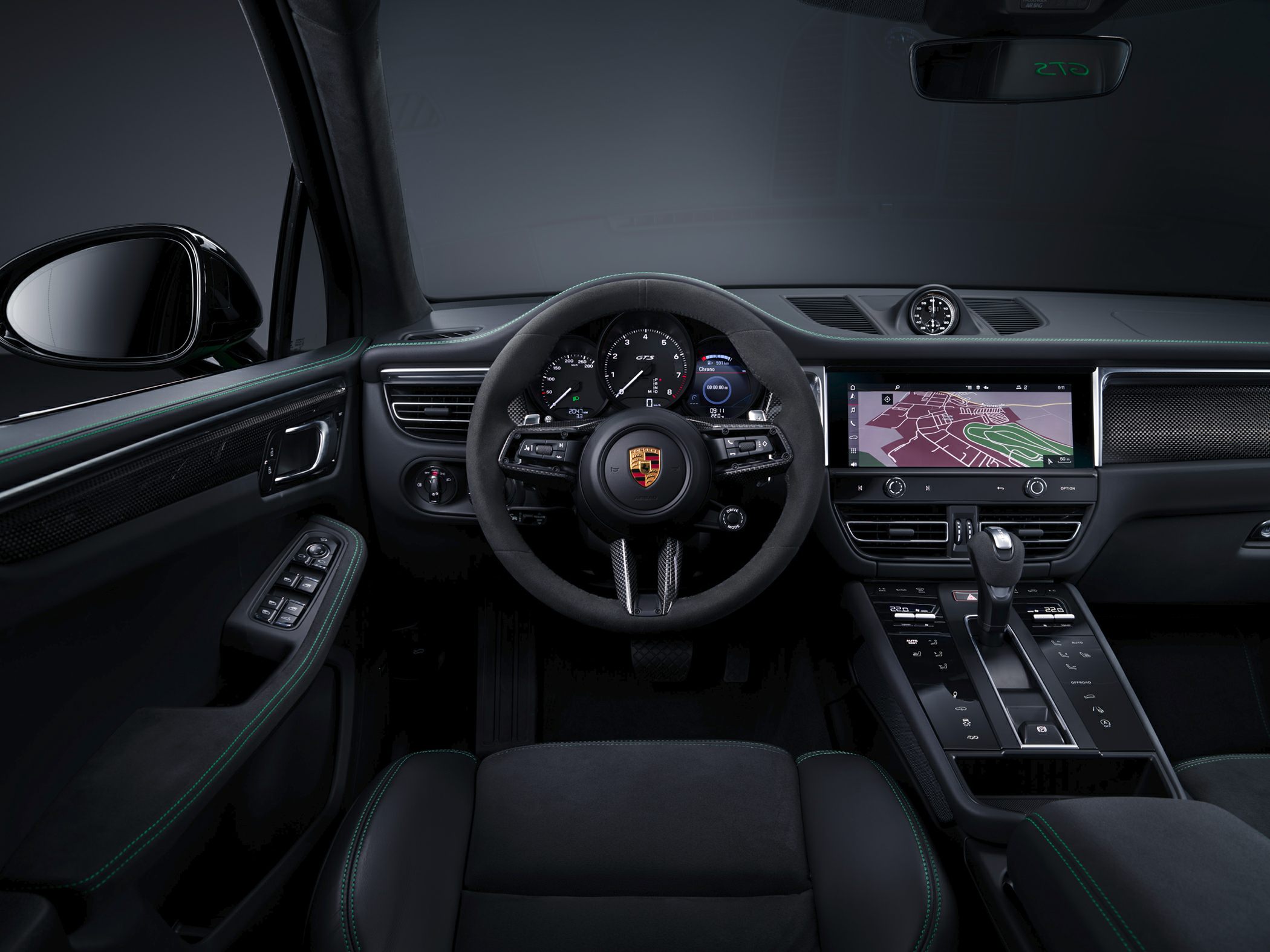 Luxury SUV interior with digital dashboard and multifunction steering wheel.