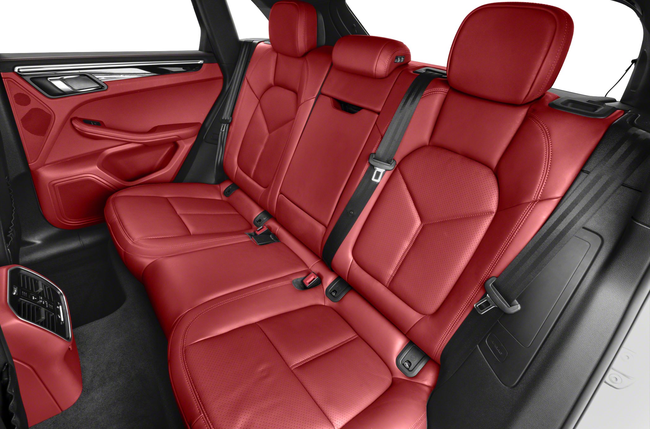 Red leather rear car seats with detailed stitching and headrests