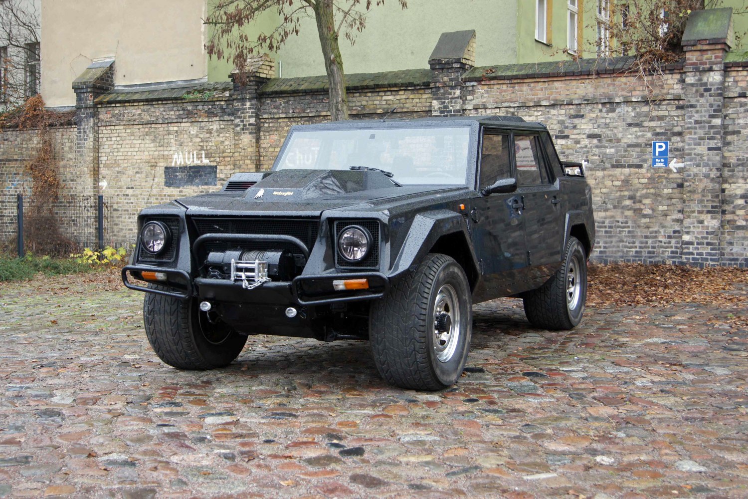 Rugged vintage SUV with winch front and angular body