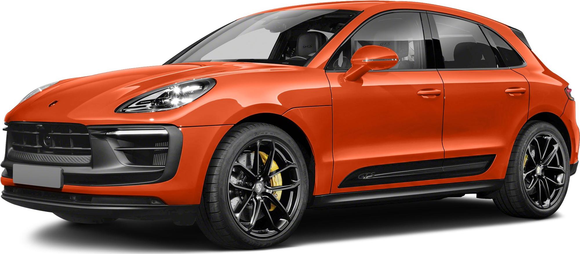 Aggressive front grille, black alloy wheels, yellow brake calipers, vibrant orange side profile
