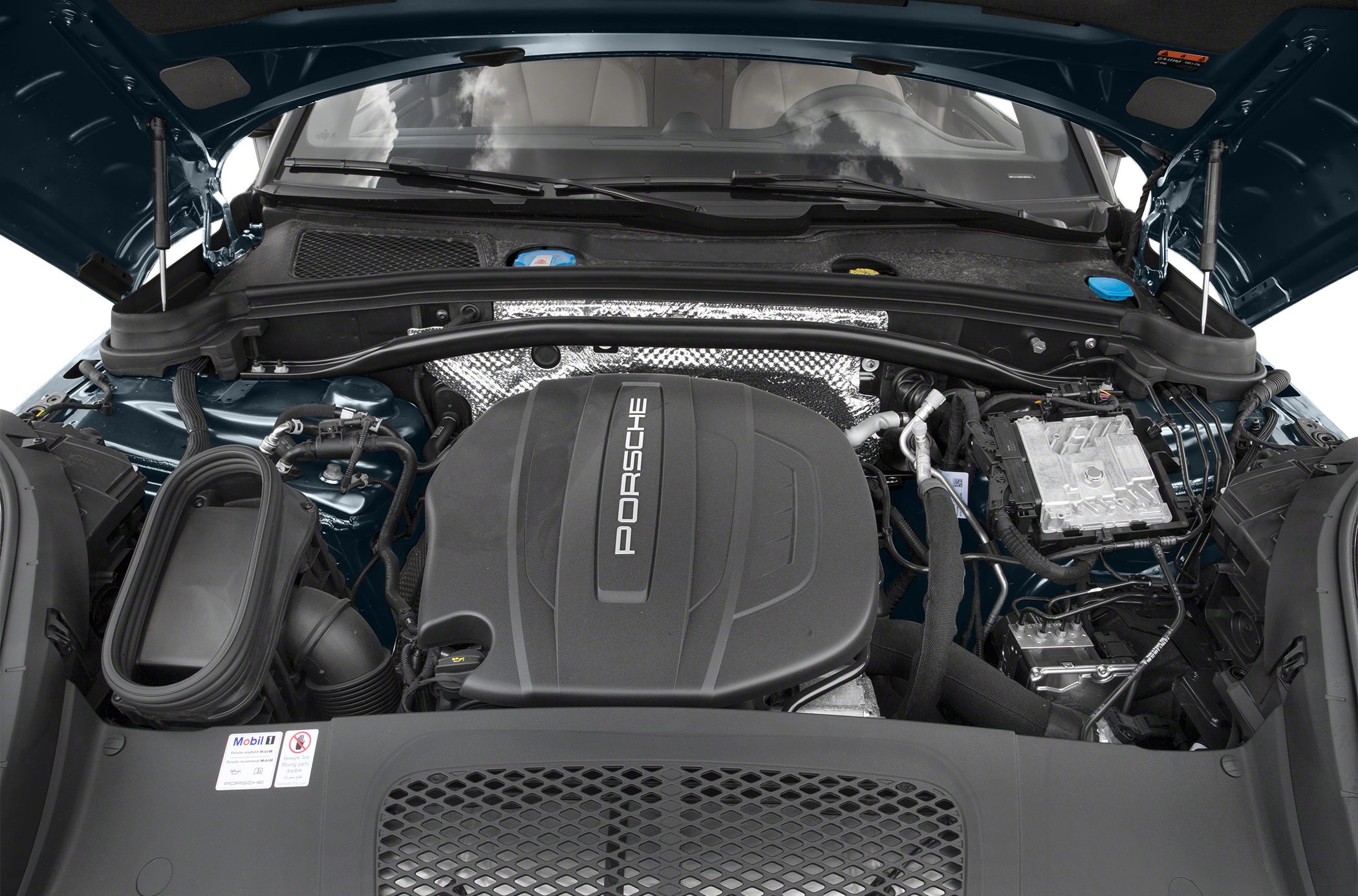 Engine bay with Porsche branded engine cover