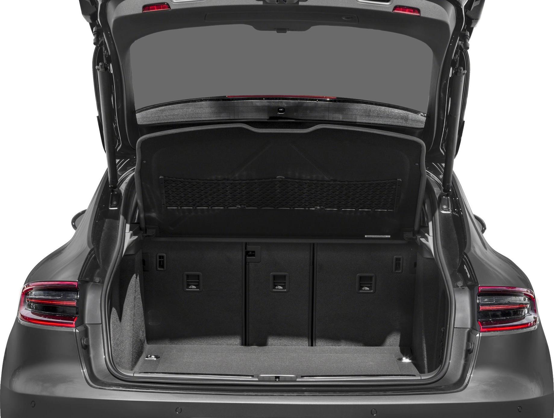 Spacious SUV trunk interior with rear cargo net and foldable seats.