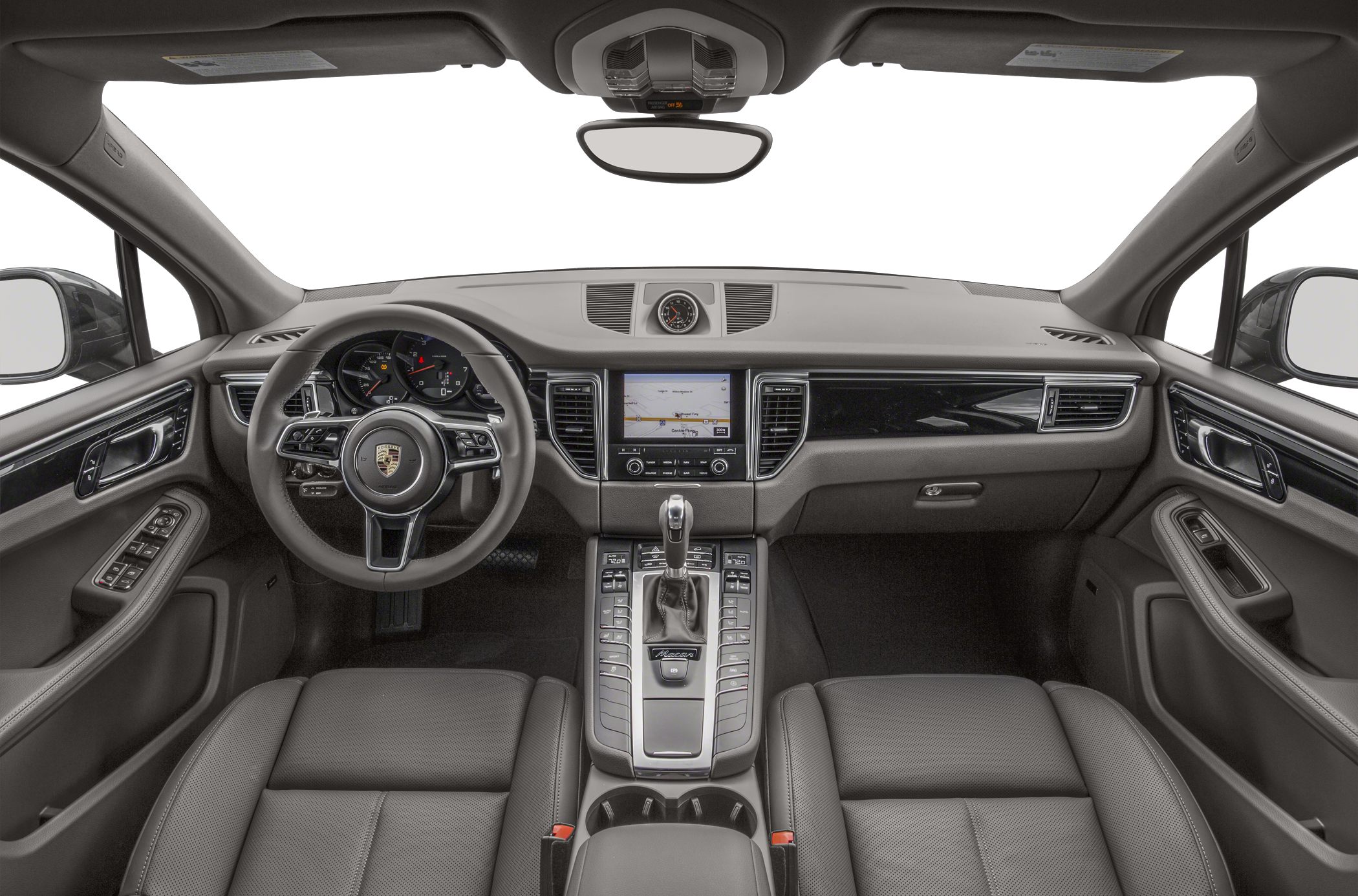 Luxury SUV interior with dashboard, steering wheel, and center console controls