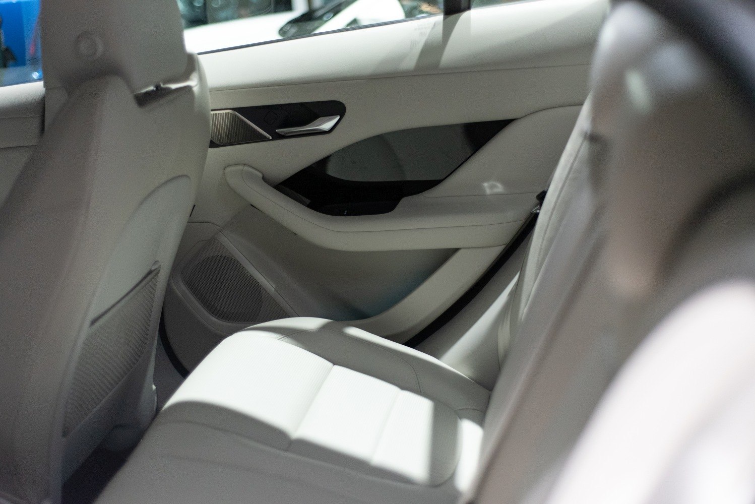 Rear seat and door panel of a luxury electric SUV interior