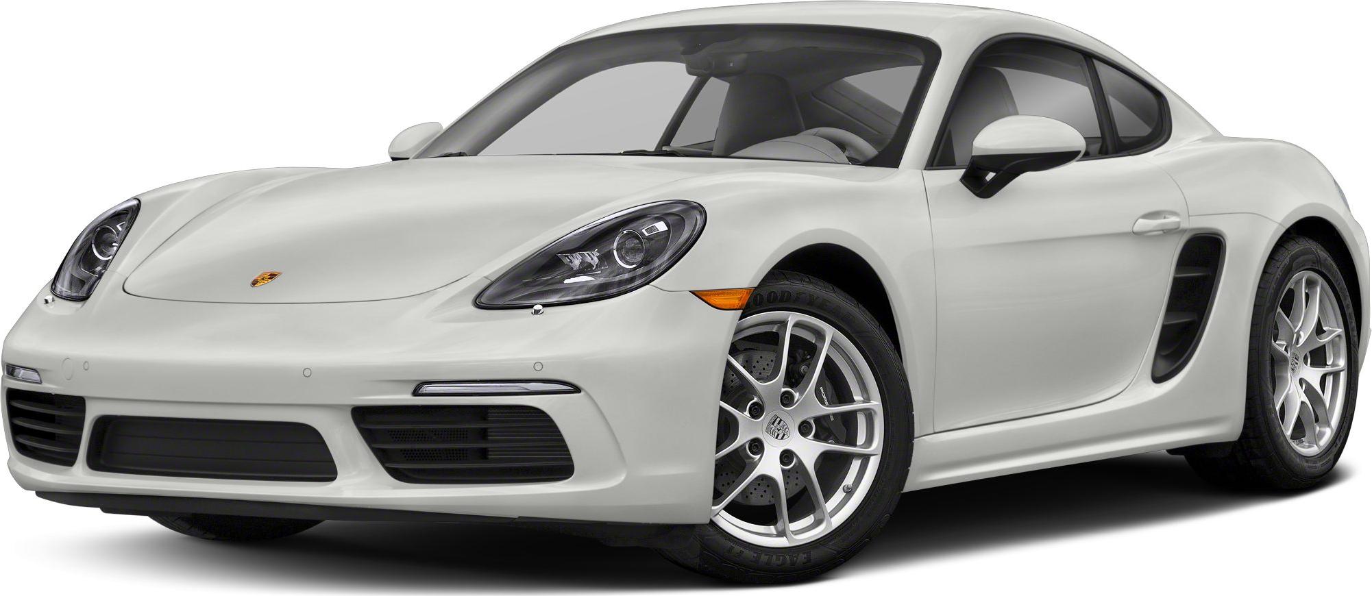 Front angle of a white sports coupe with aerodynamic design and distinct headlights