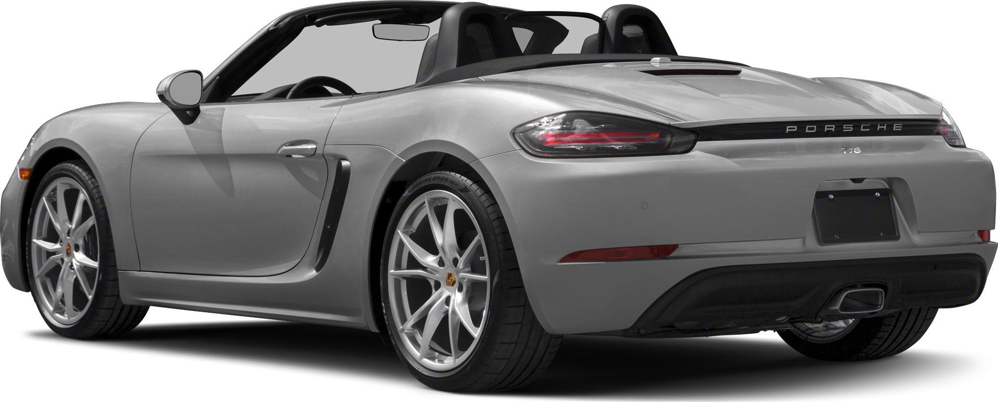 Rear side view of a convertible with alloy wheels and side air intake