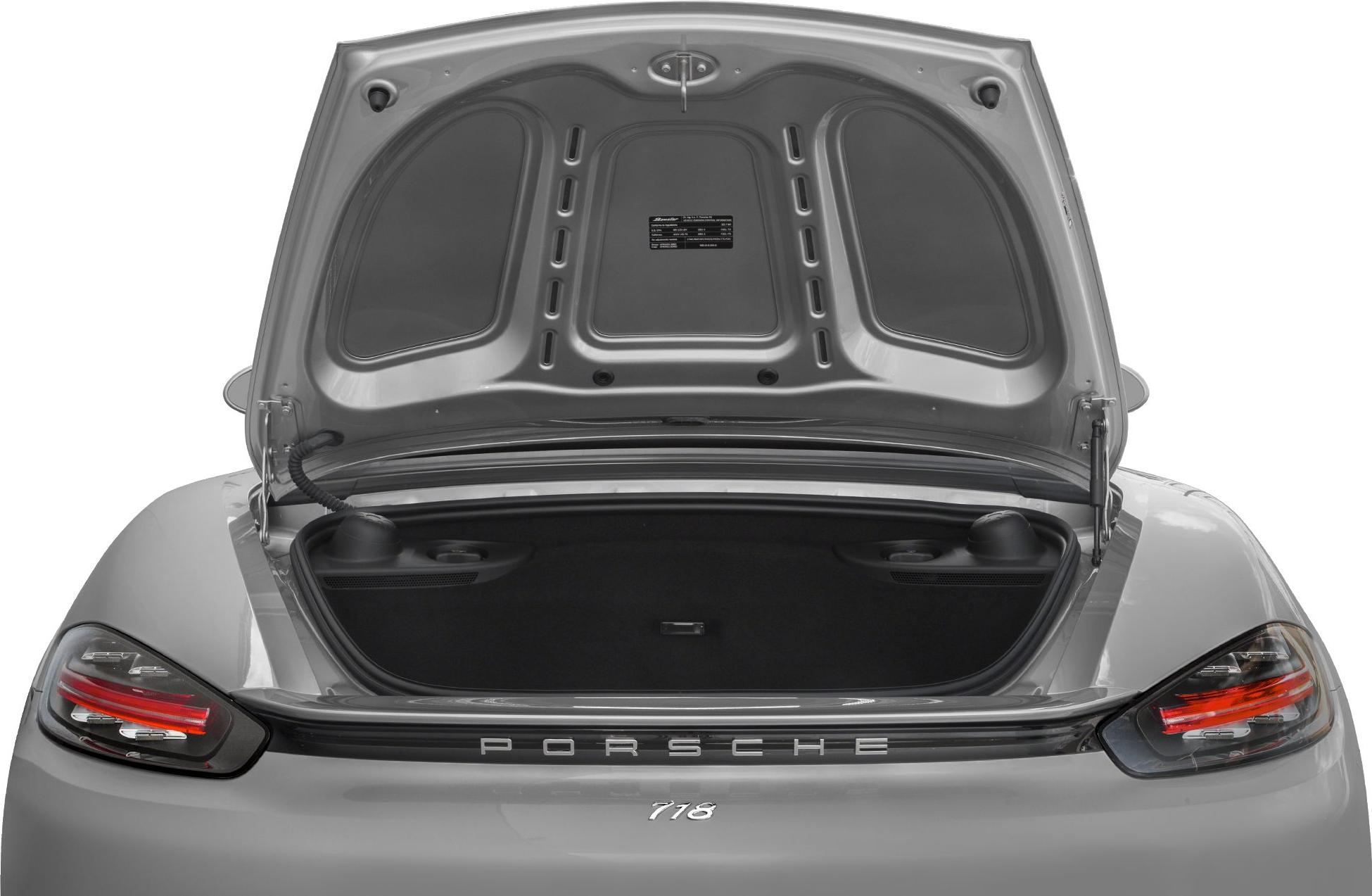 Open rear trunk storage with black interior and trunk lid details
