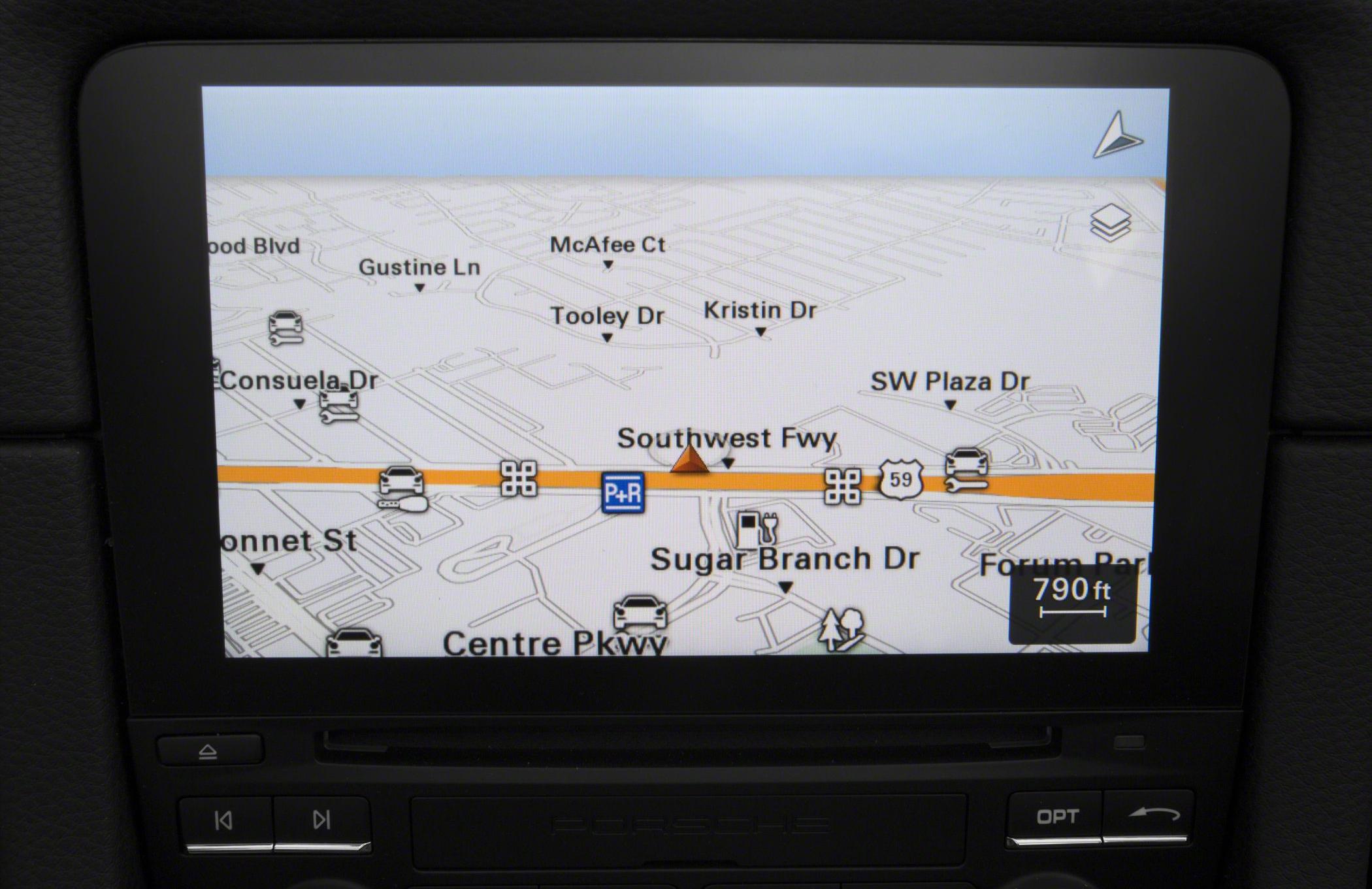 High-resolution car navigation system display with detailed map and route guidance.