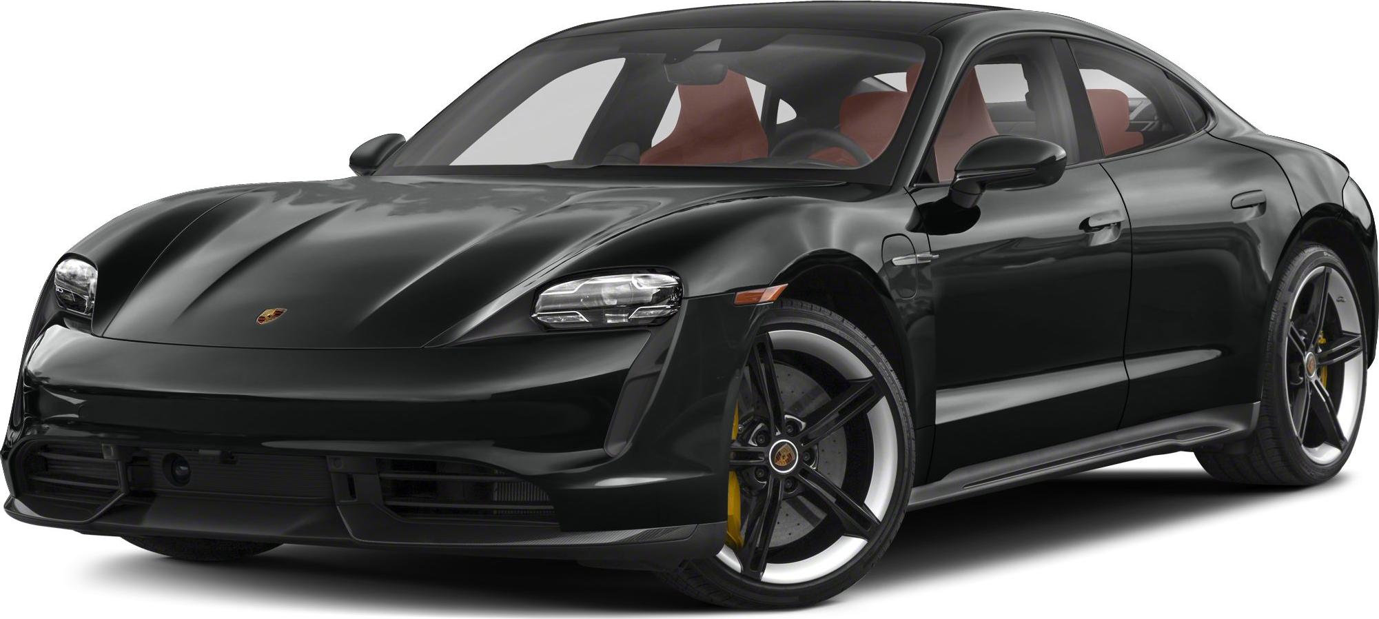 Sleek black electric sports sedan, aerodynamic with LED headlights and performance wheels