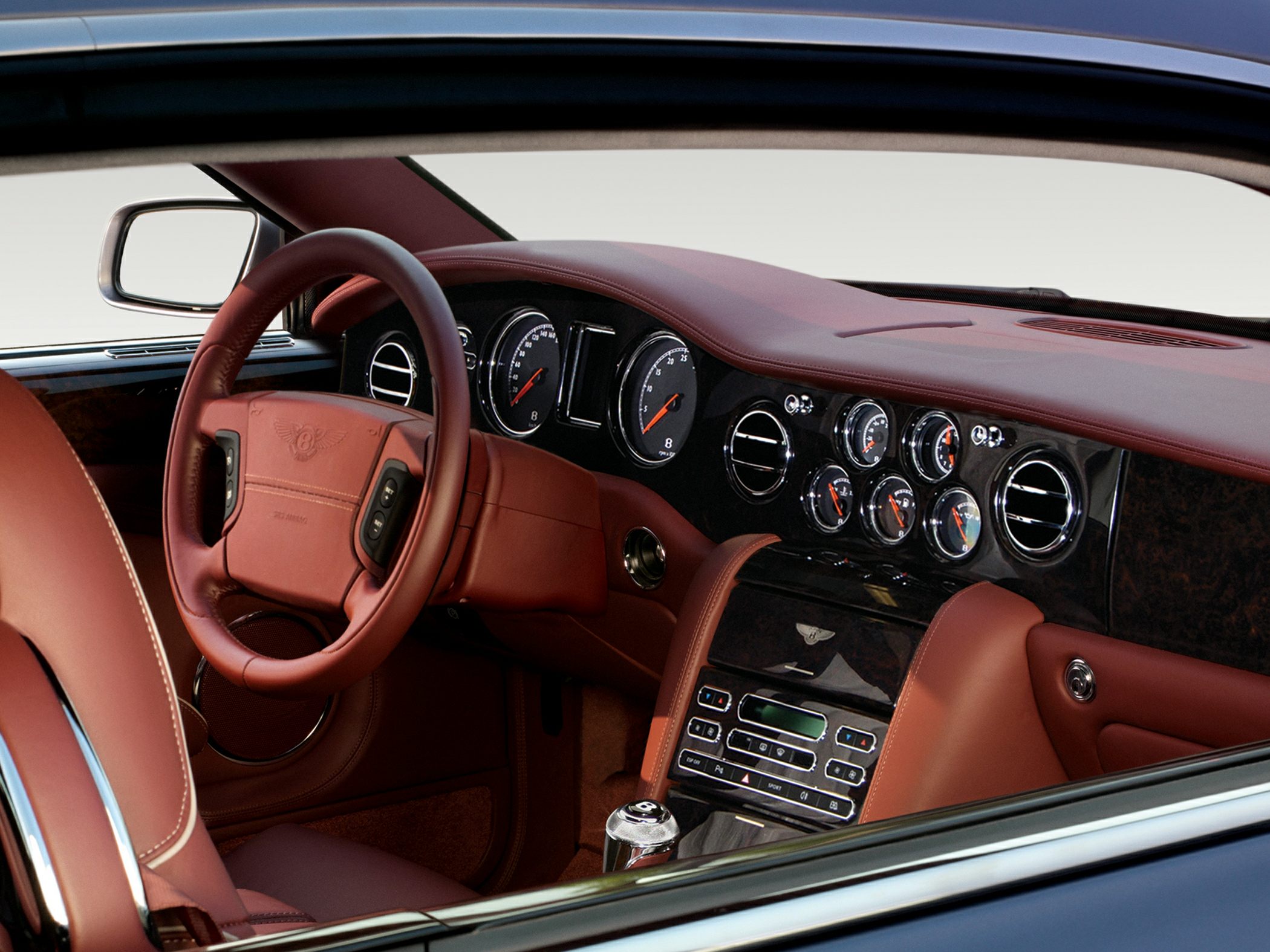 Luxury leather dashboard and classic analog gauges