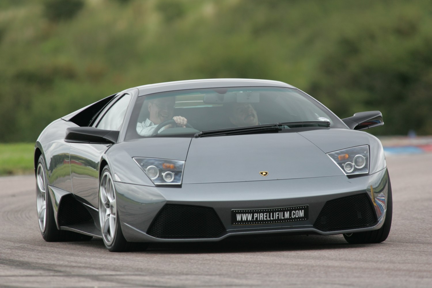 Front view with sharp headlights and aerodynamic design
