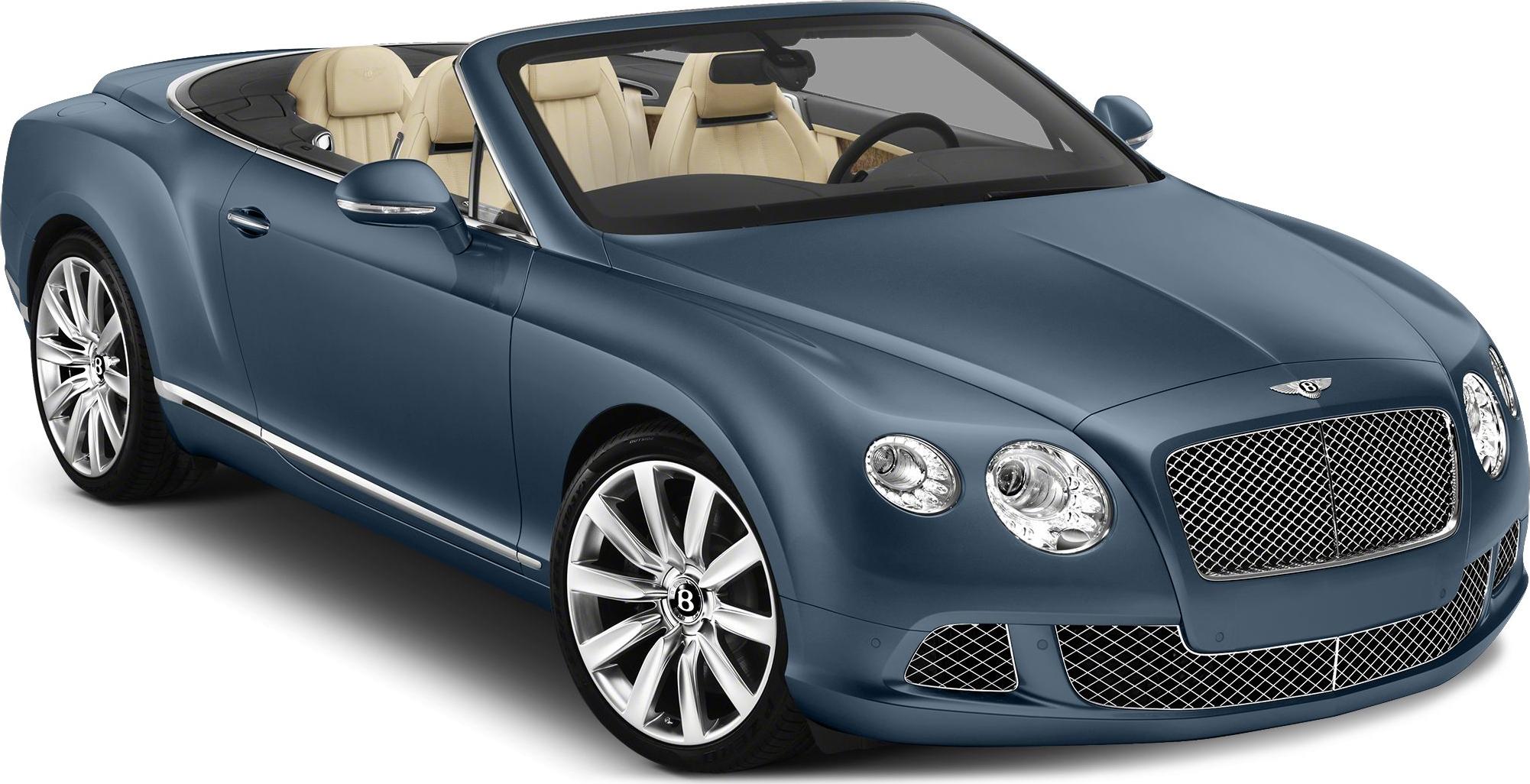 Luxury convertible with dual round headlights and beige leather interior