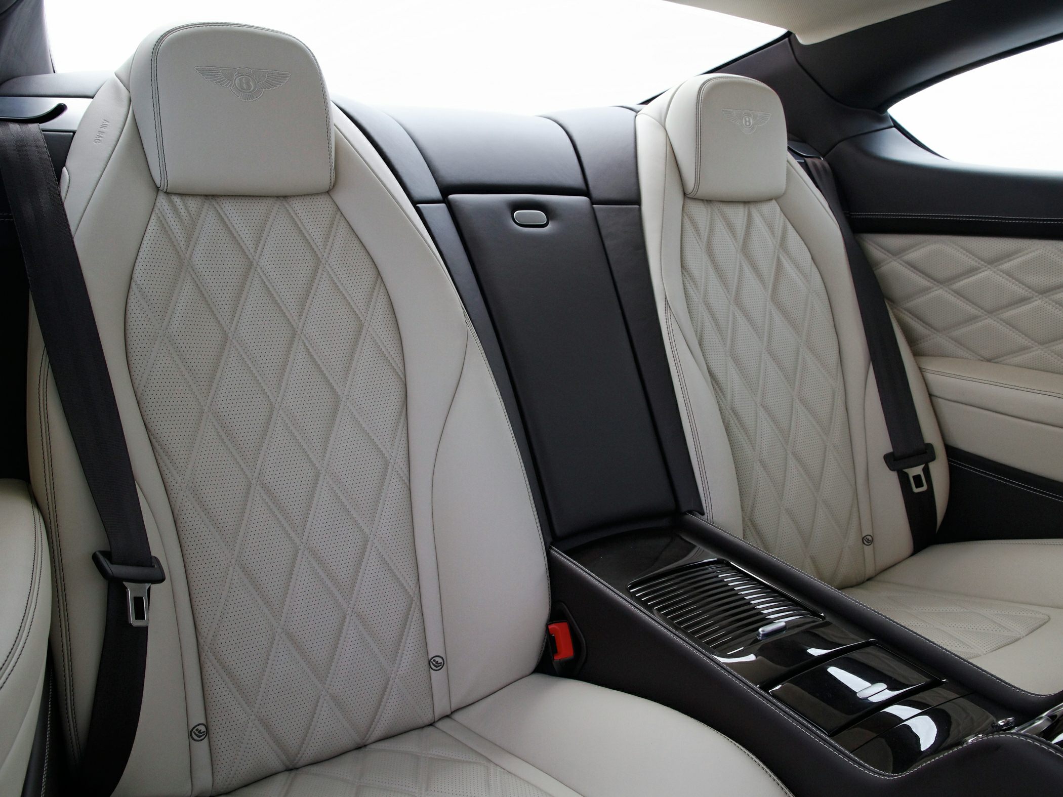 Quilted leather rear seats with Bentley emblem and central console