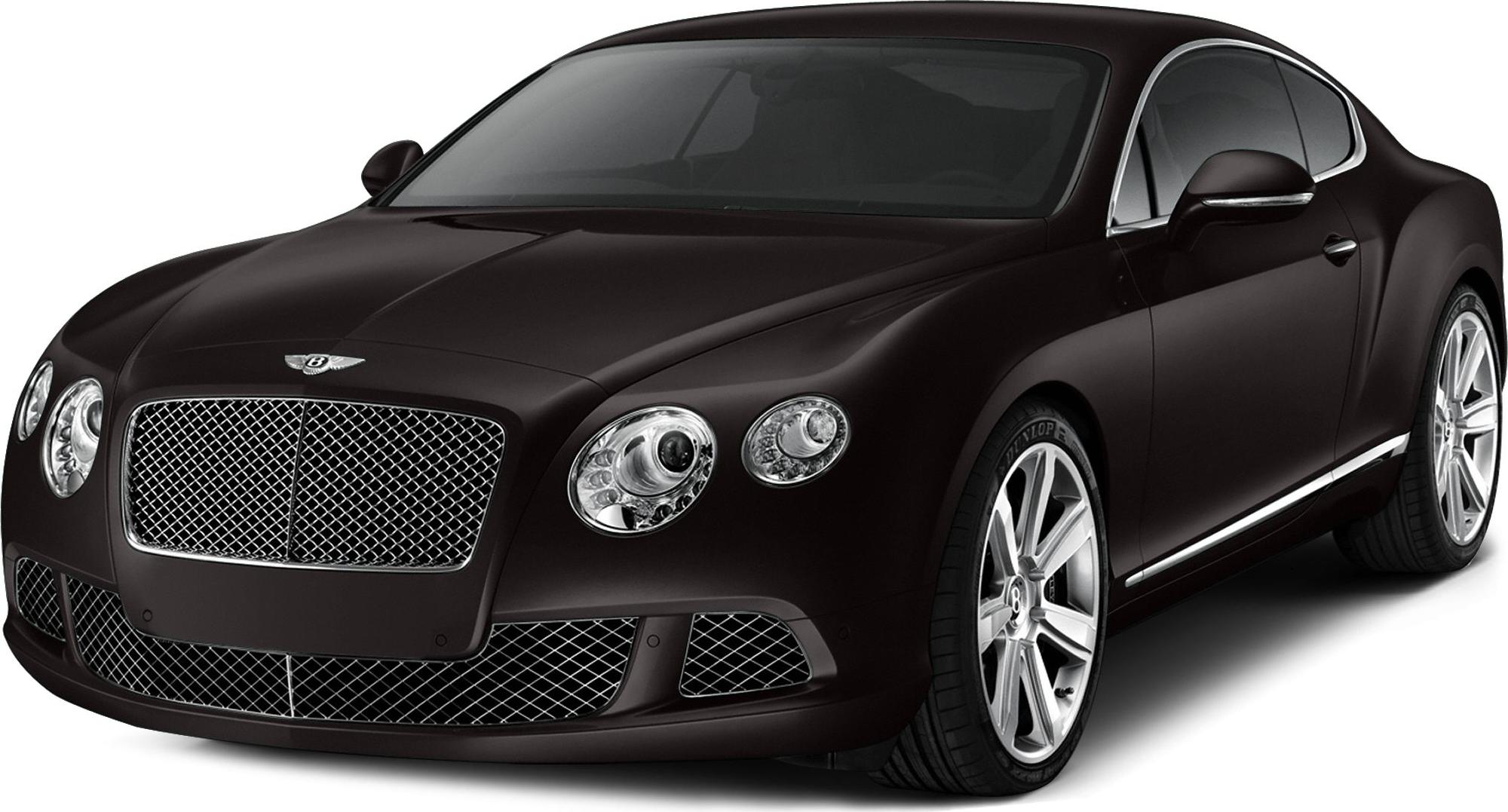 Front view with wide chrome grille and dual round headlights