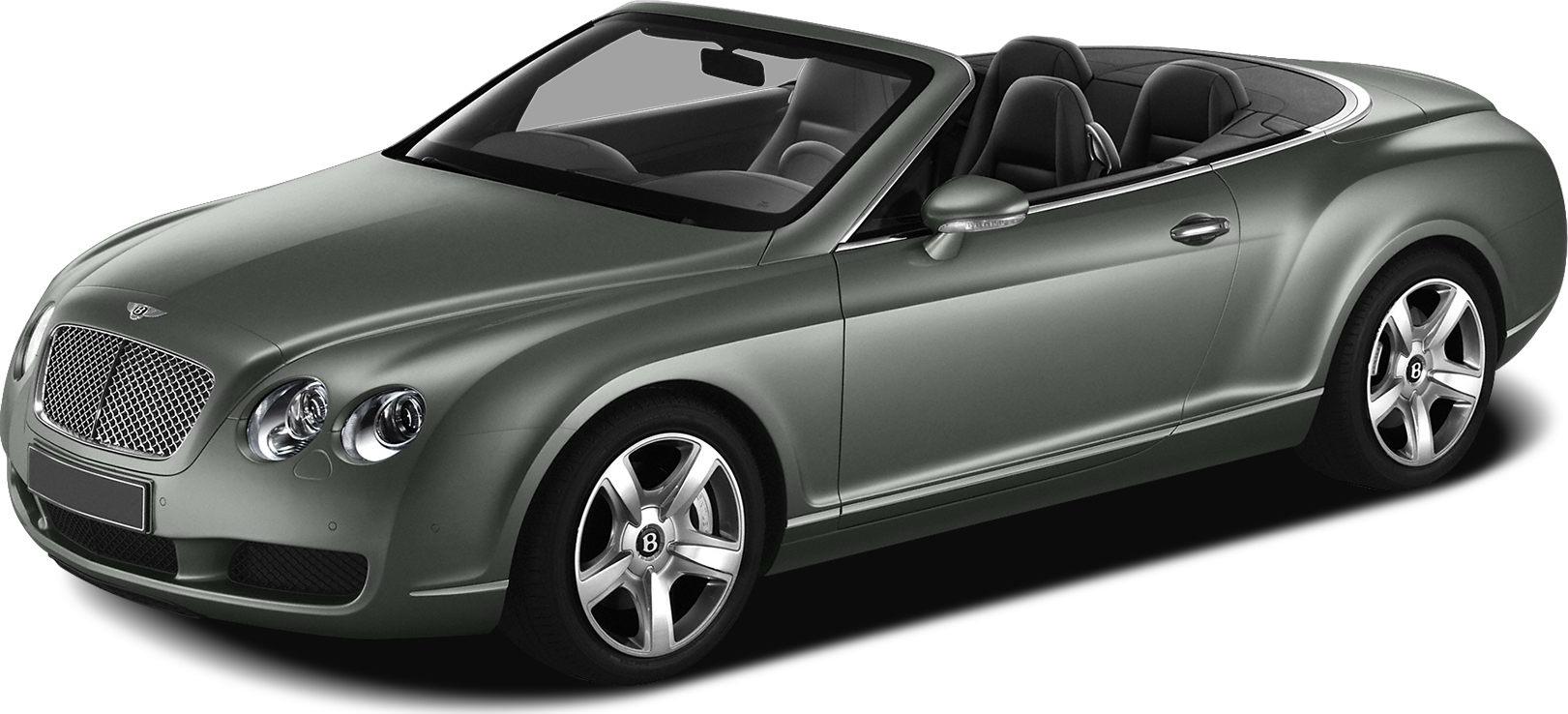 Convertible car with dual round headlights and five-spoke alloy wheels
