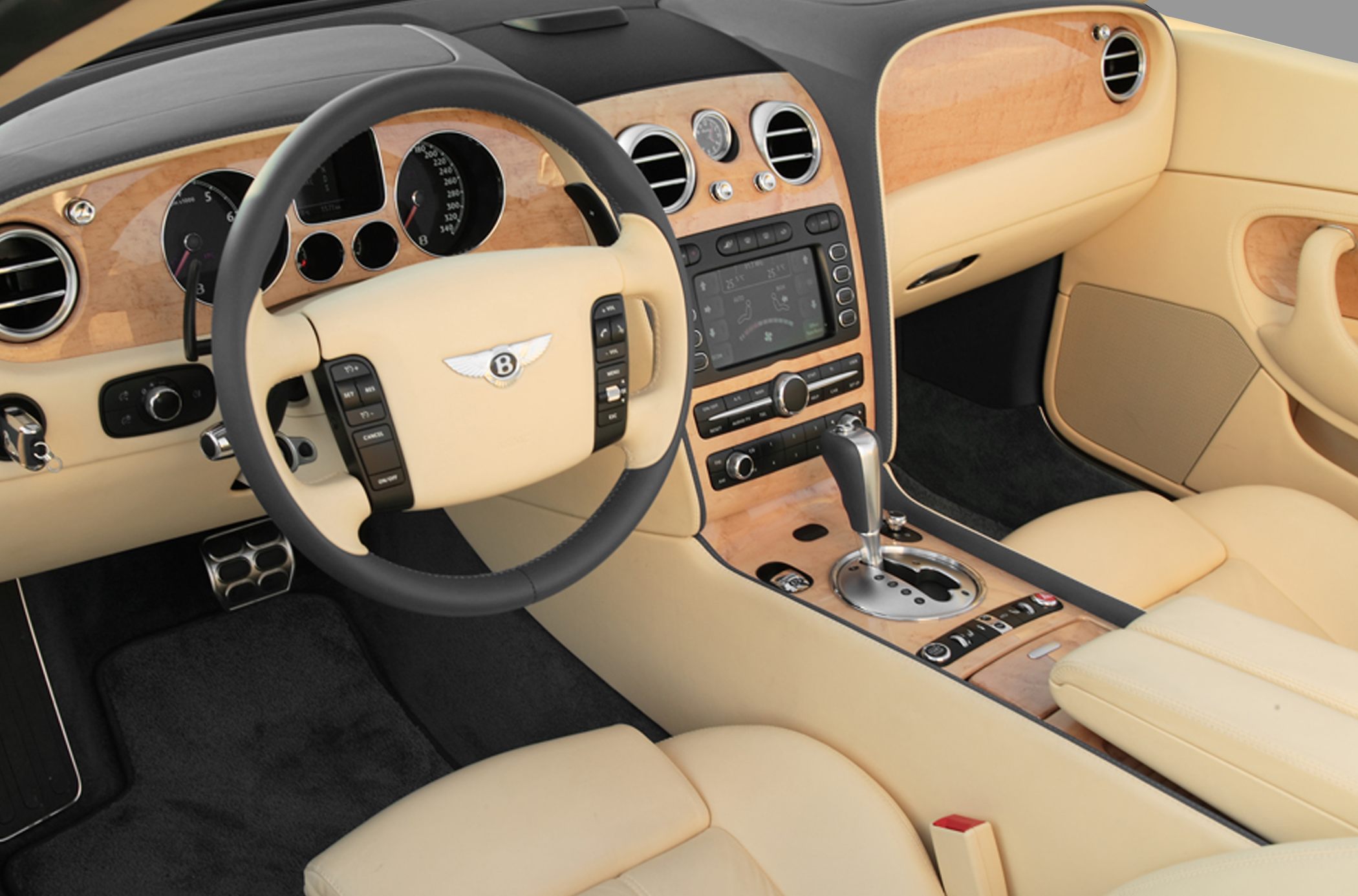 Convertible interior with beige leather and wood trim