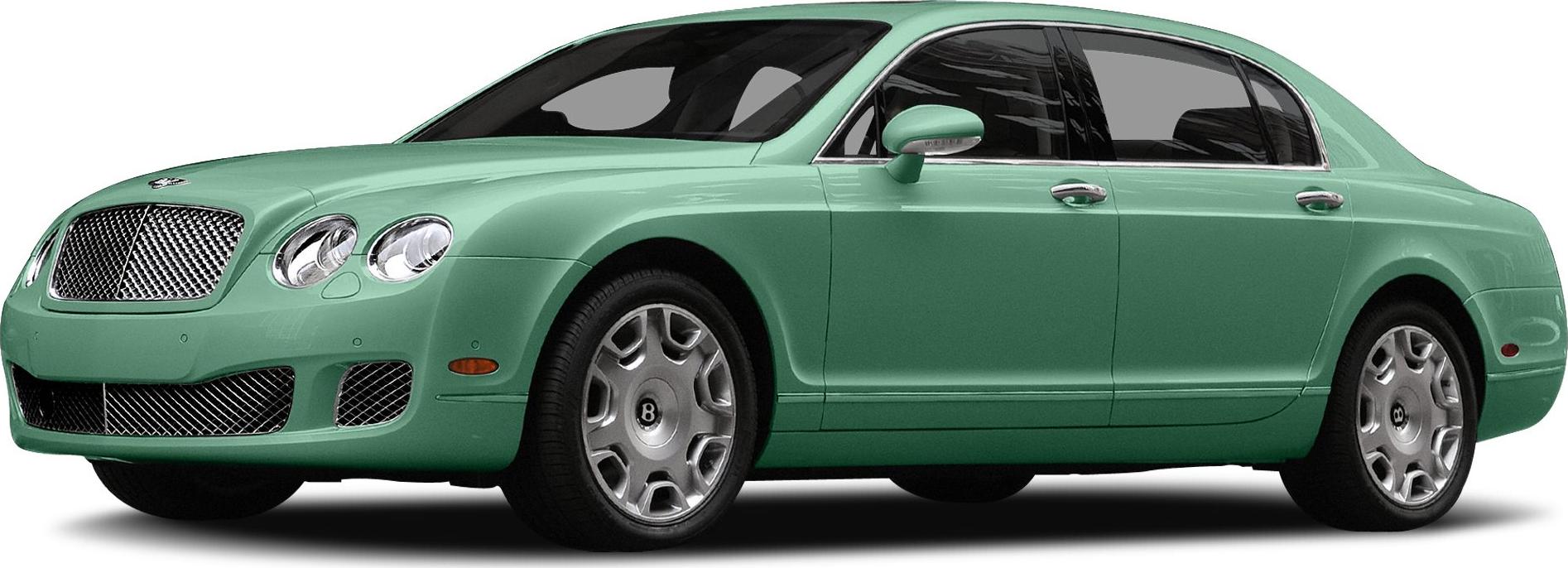 Luxury sedan with chrome grille and dual round headlights