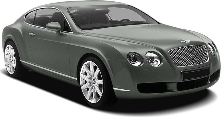 Front-angle view of a luxury coupe with dual round headlights and a large, mesh front grille.