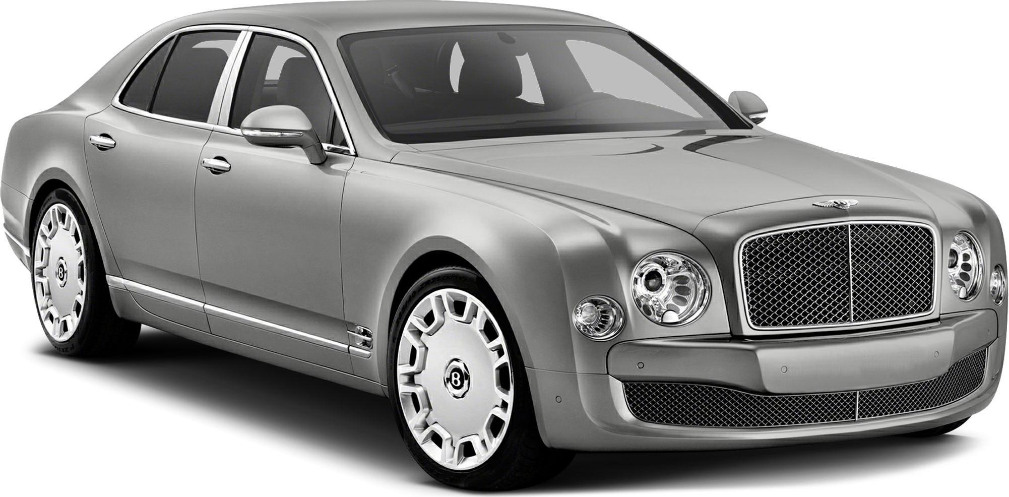 Front view of luxury sedan with prominent grille and round headlights