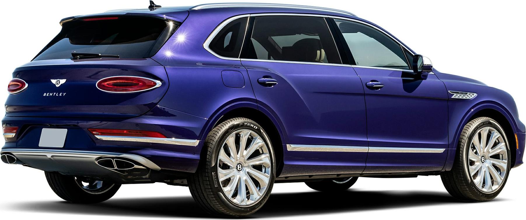 Luxury SUV with oval tail lights and chrome wheels from rear-side angle