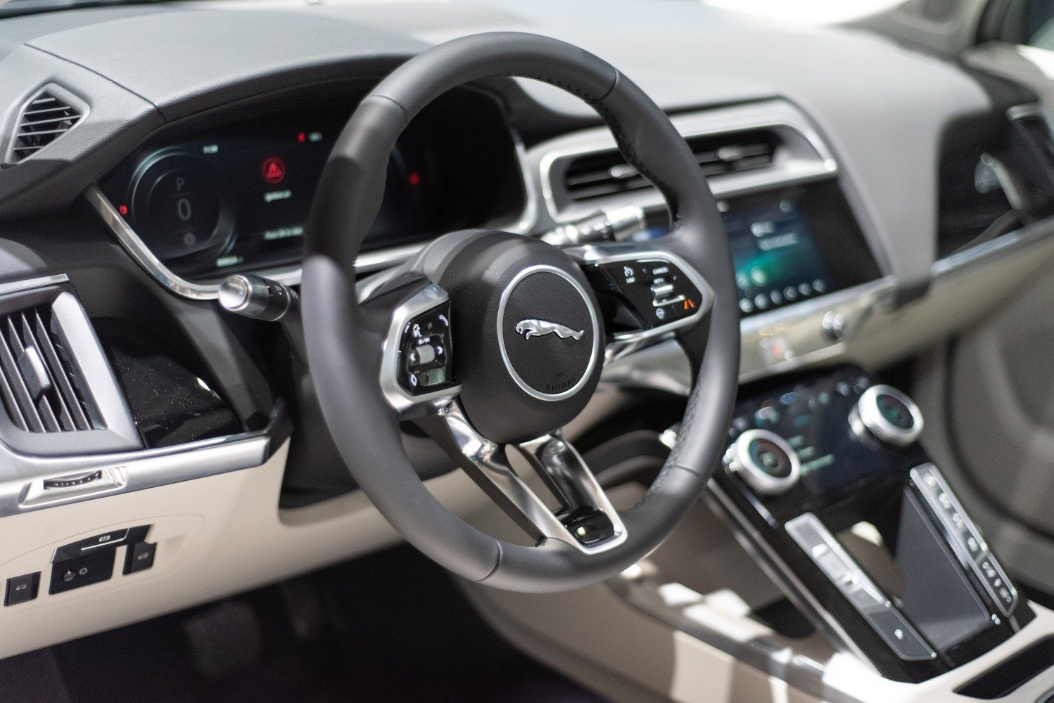 Modern digital dashboard and steering wheel with multimedia displays