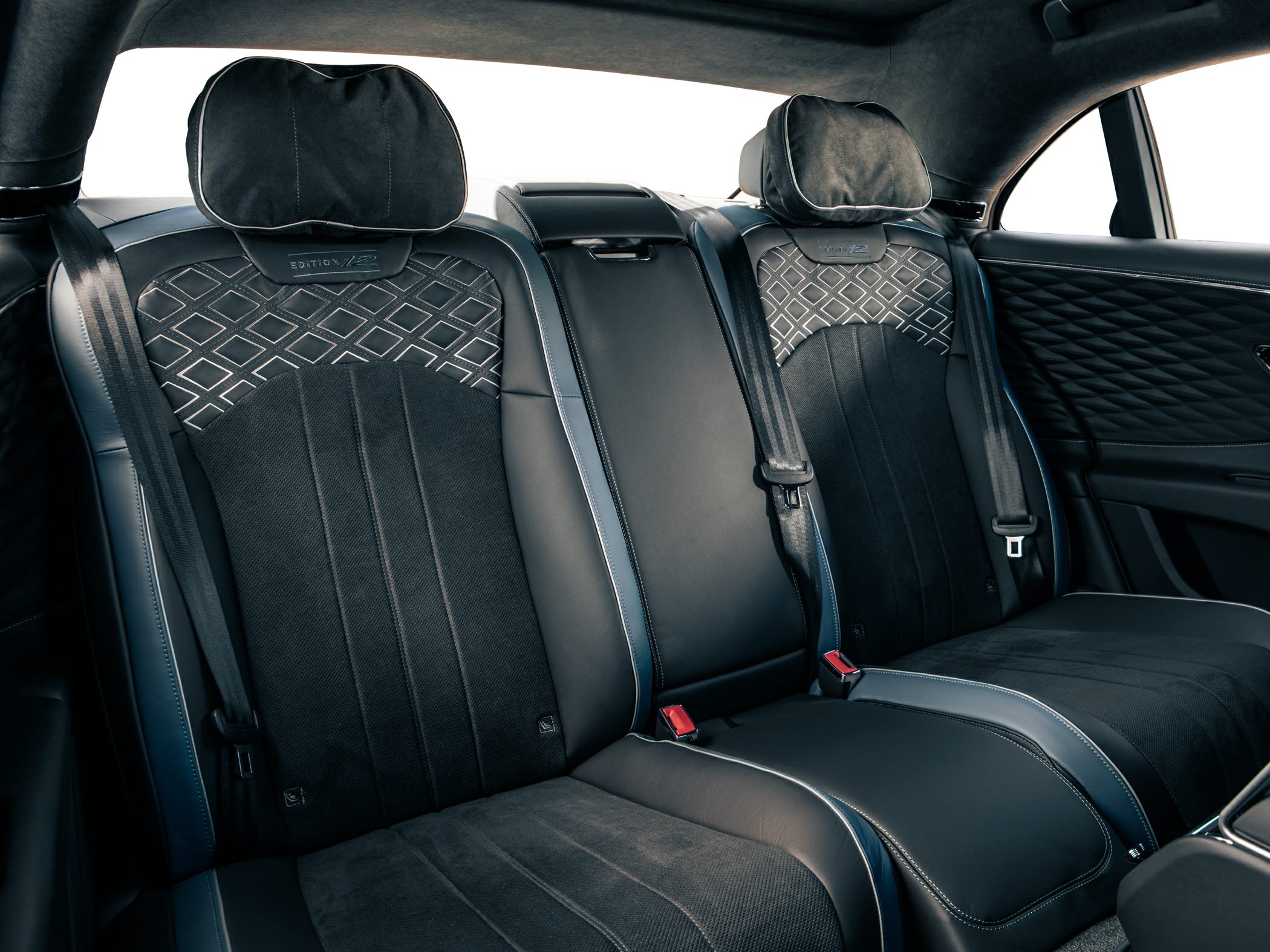 Quilted upholstery and plush headrests in luxury rear seating
