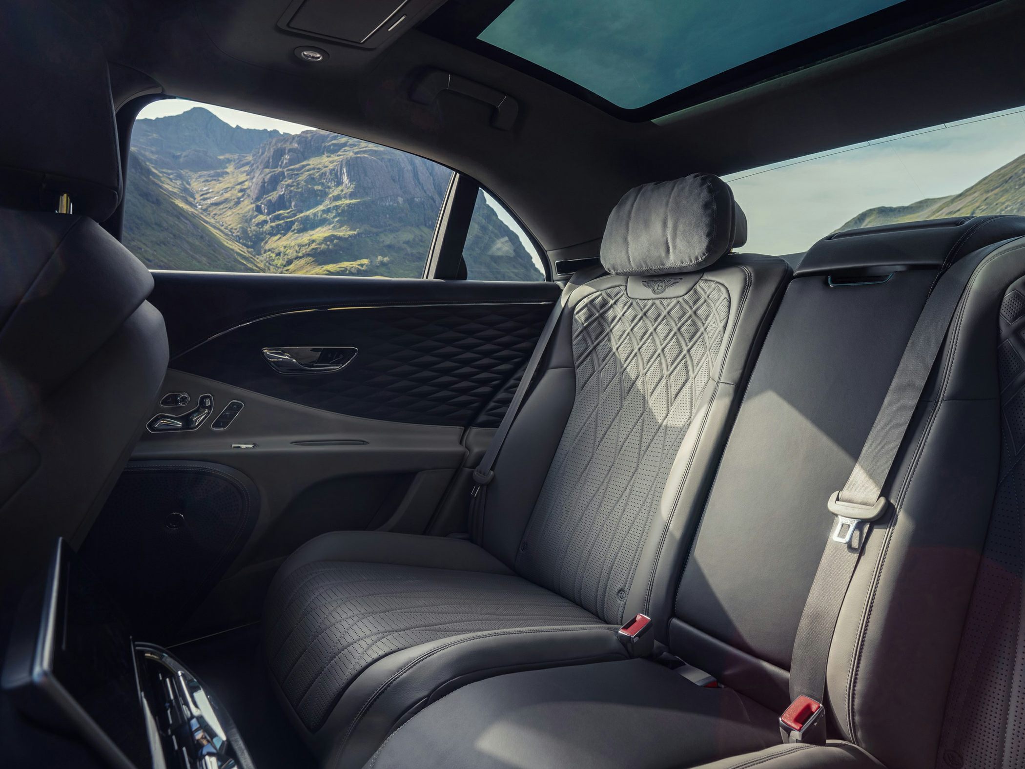 Luxury rear seats with quilted leather upholstery and panoramic roof