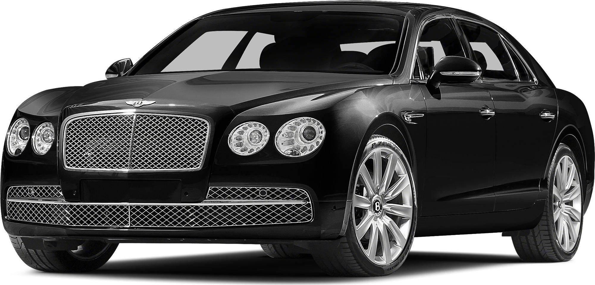 Front view of luxury sedan showcasing mesh grille and round dual headlights