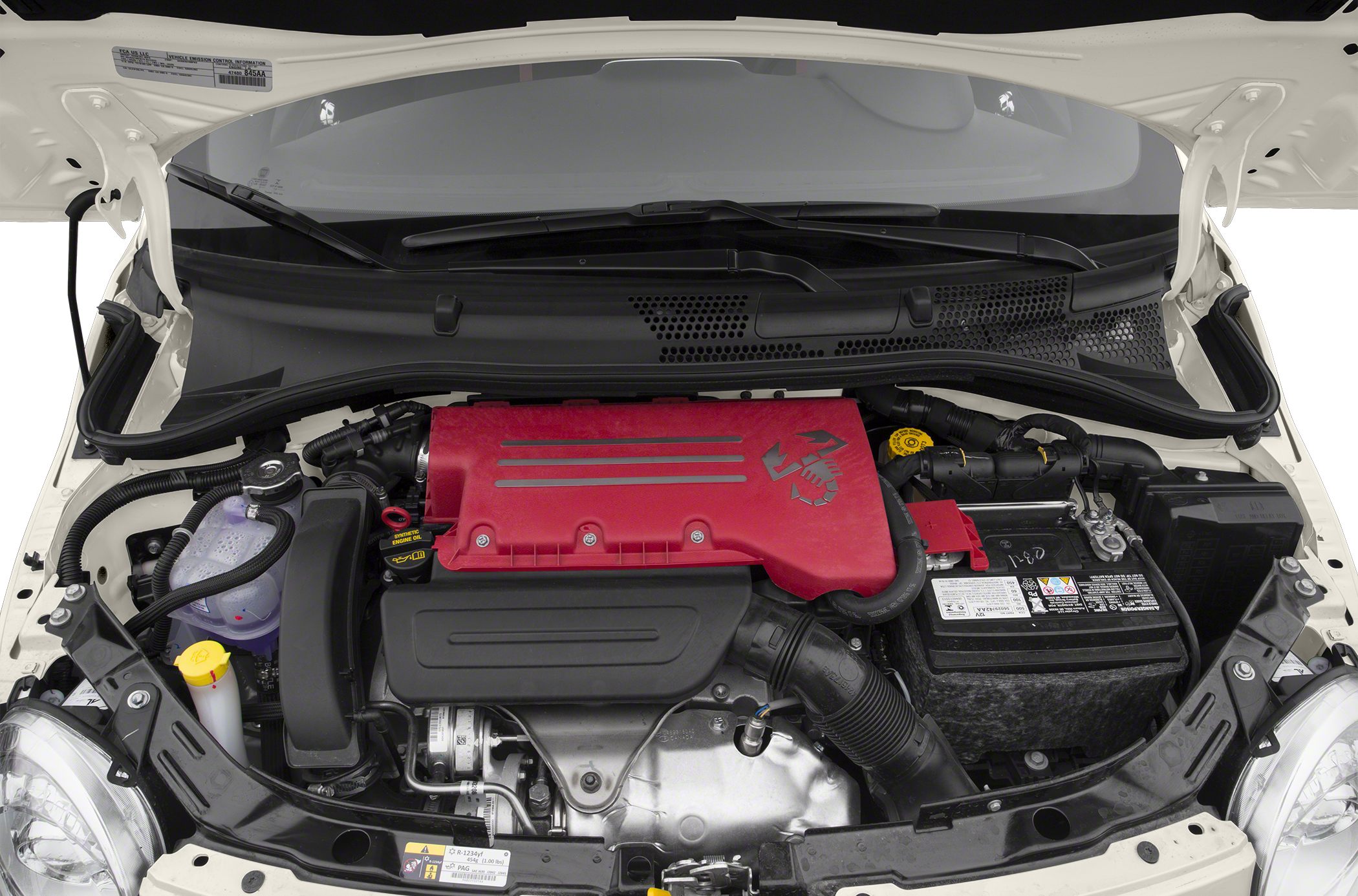 Engine bay with red cover and battery in compact layout