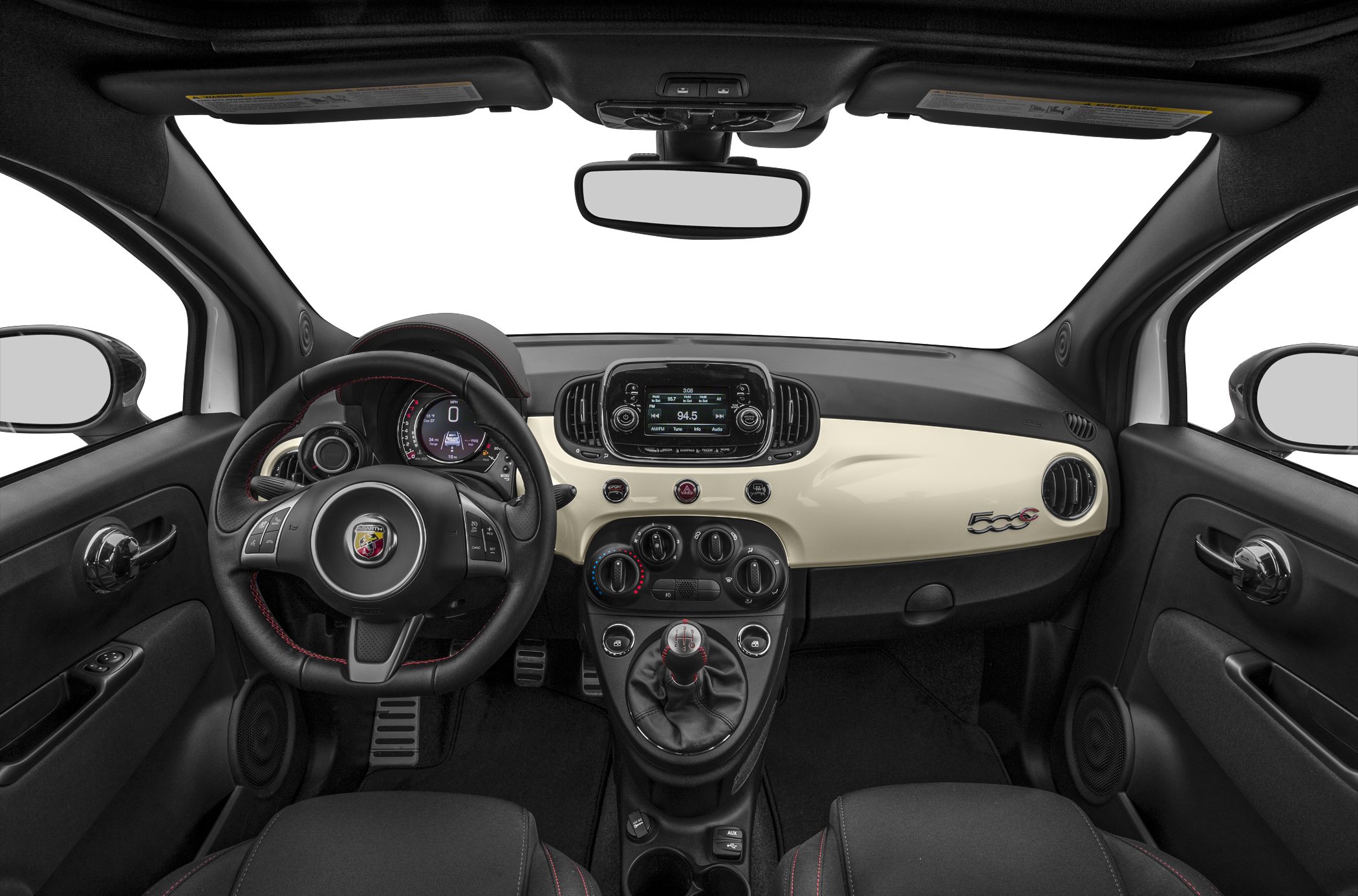 Car interior with dashboard, cockpit view, and manual gearbox.