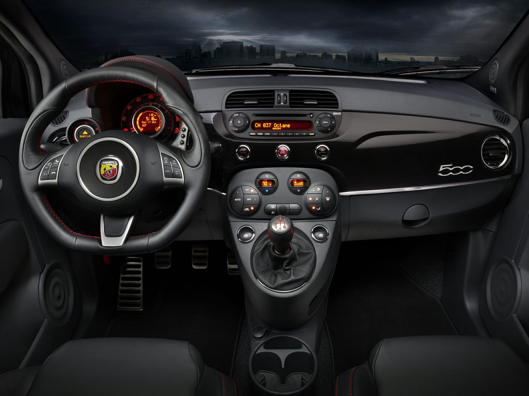 Steering wheel, dashboard, manual gear shift, center console