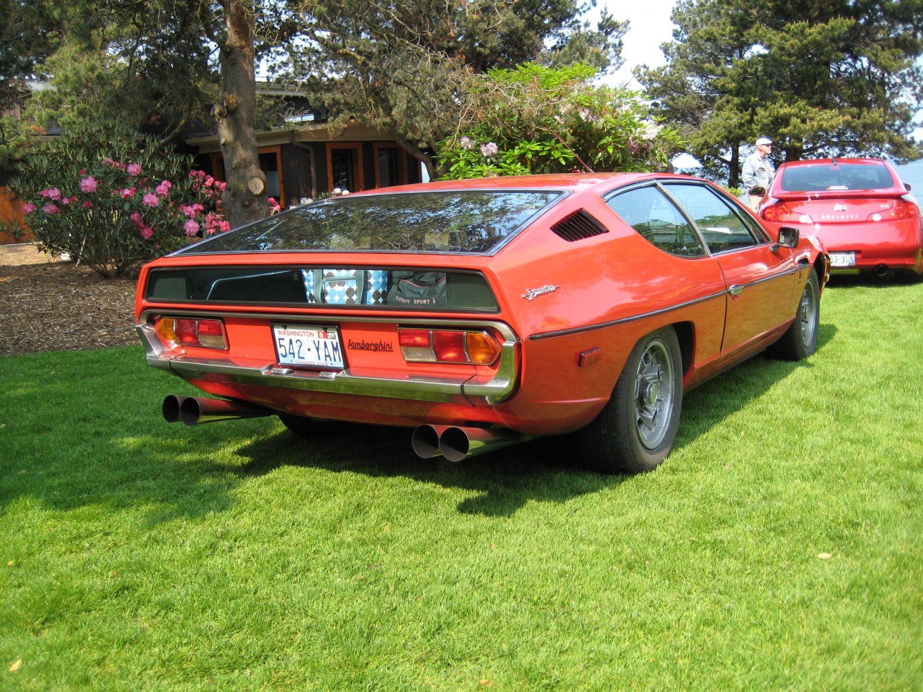 Rear view with quad exhaust and distinctive angular rear design