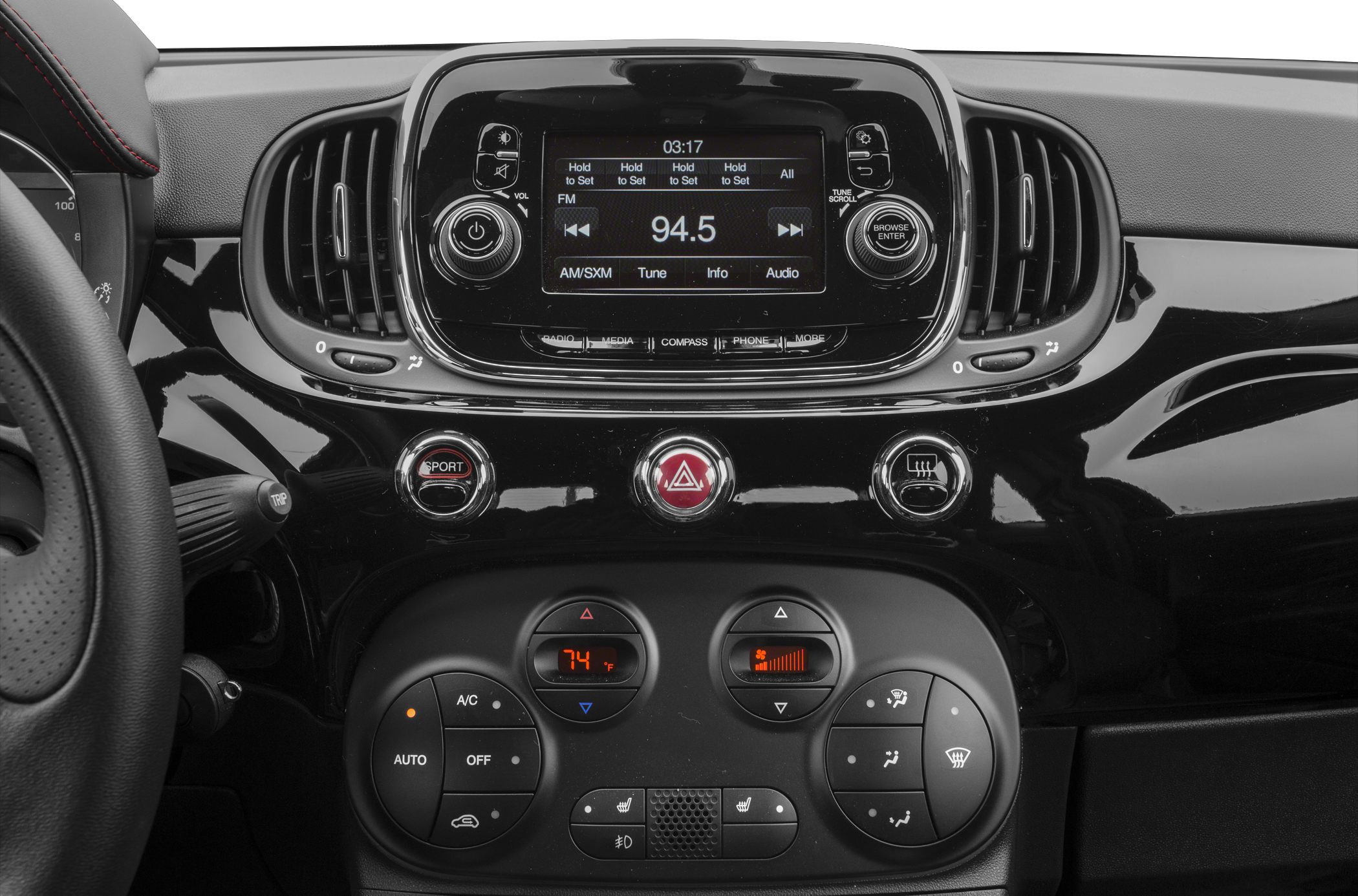 Center console with radio, climate control, and sport mode button