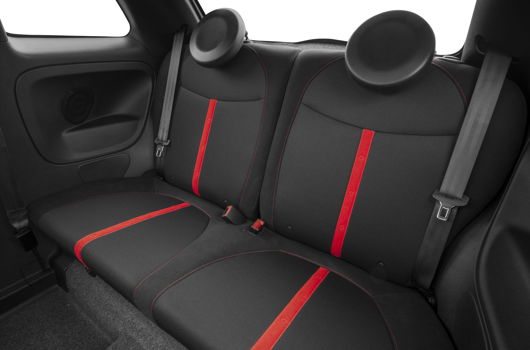 Black rear car seats with red vertical stripes and rounded headrests