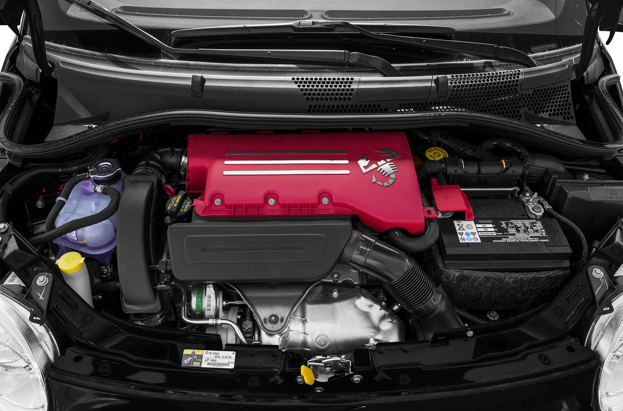 Engine bay with distinctive red engine cover and auto components