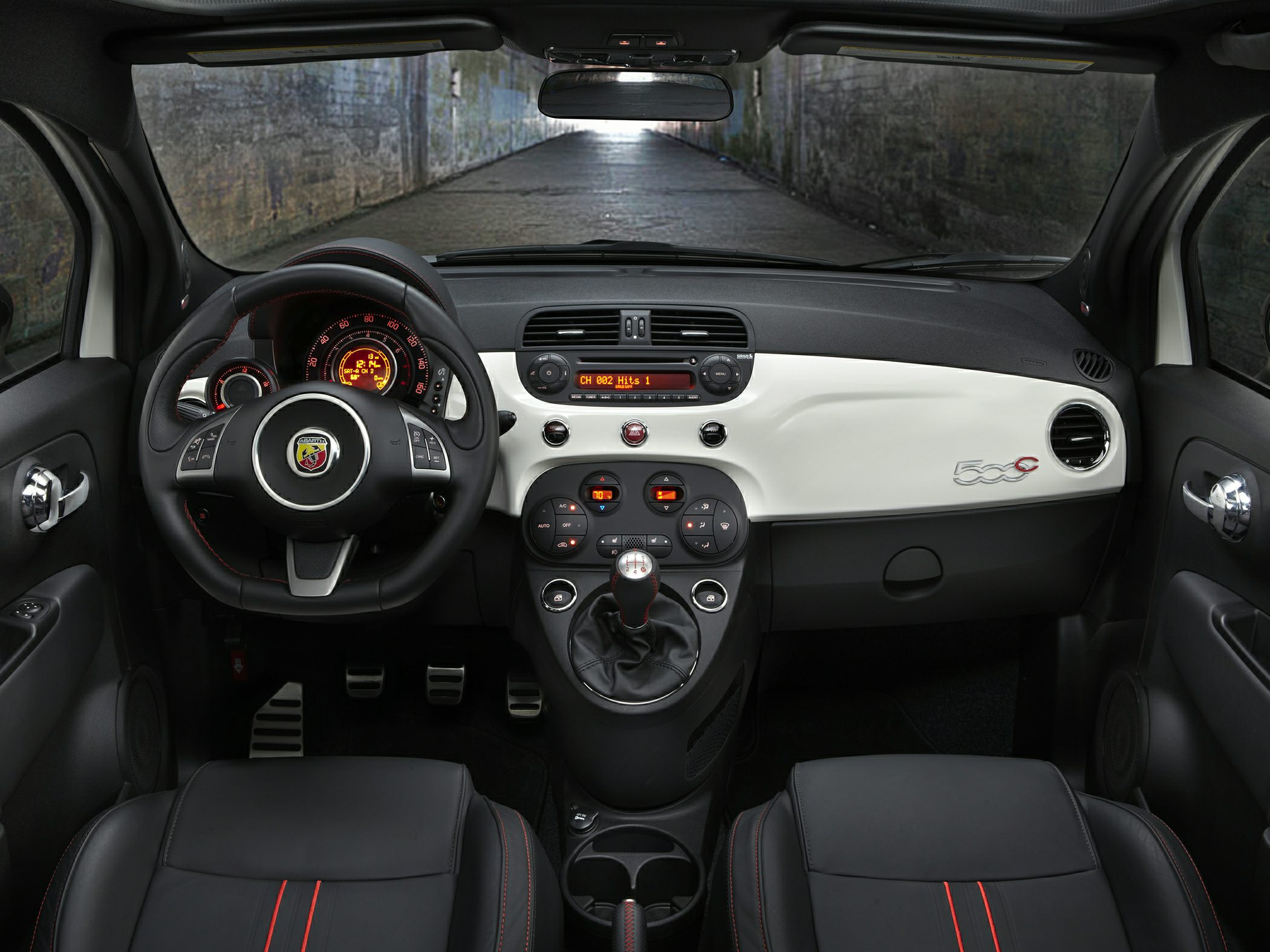 Dashboard and steering wheel with center console of compact car interior