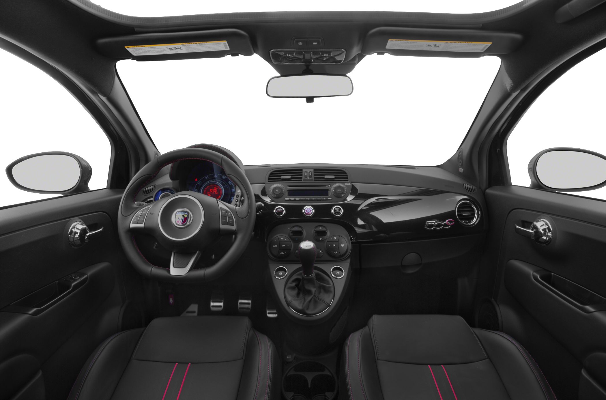 Dashboard, steering wheel, and center console with manual gear lever