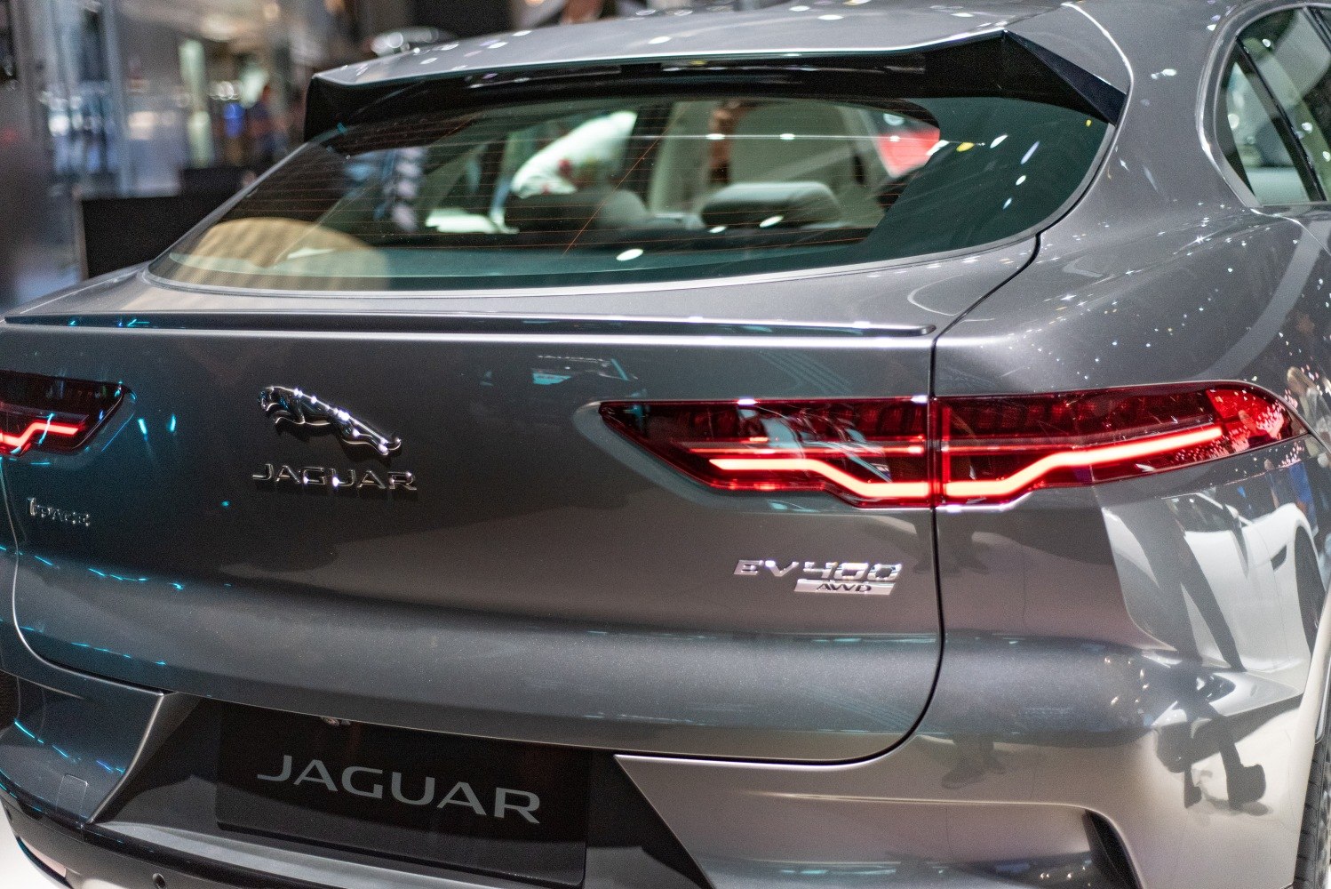 Rear view with distinctive taillights and EV400 AWD badge