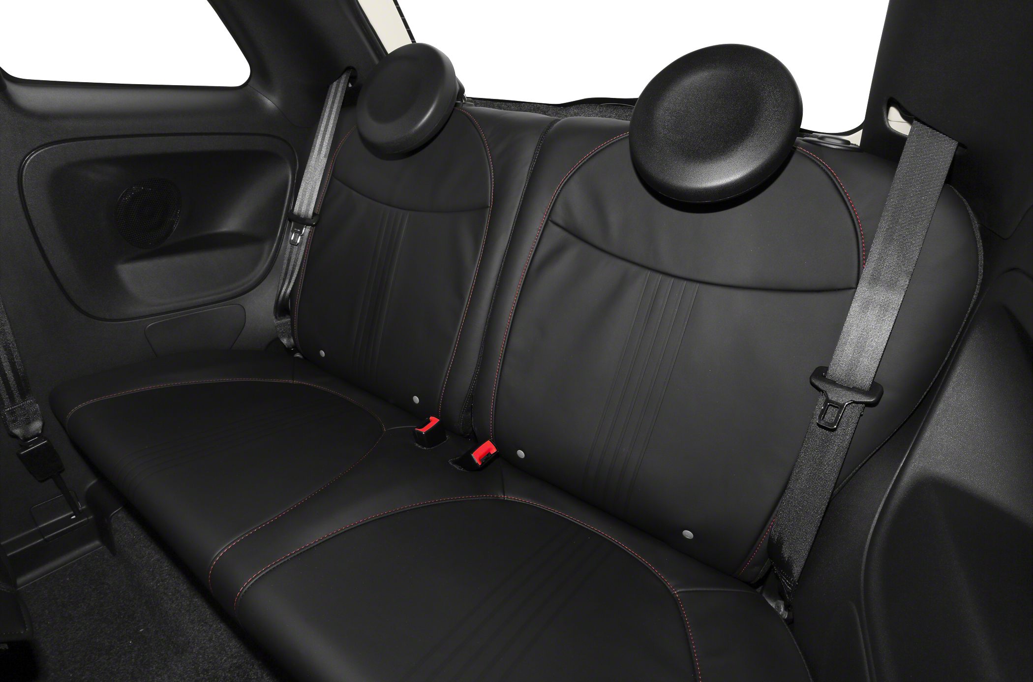 Black leather rear seats with round headrests and seat belts