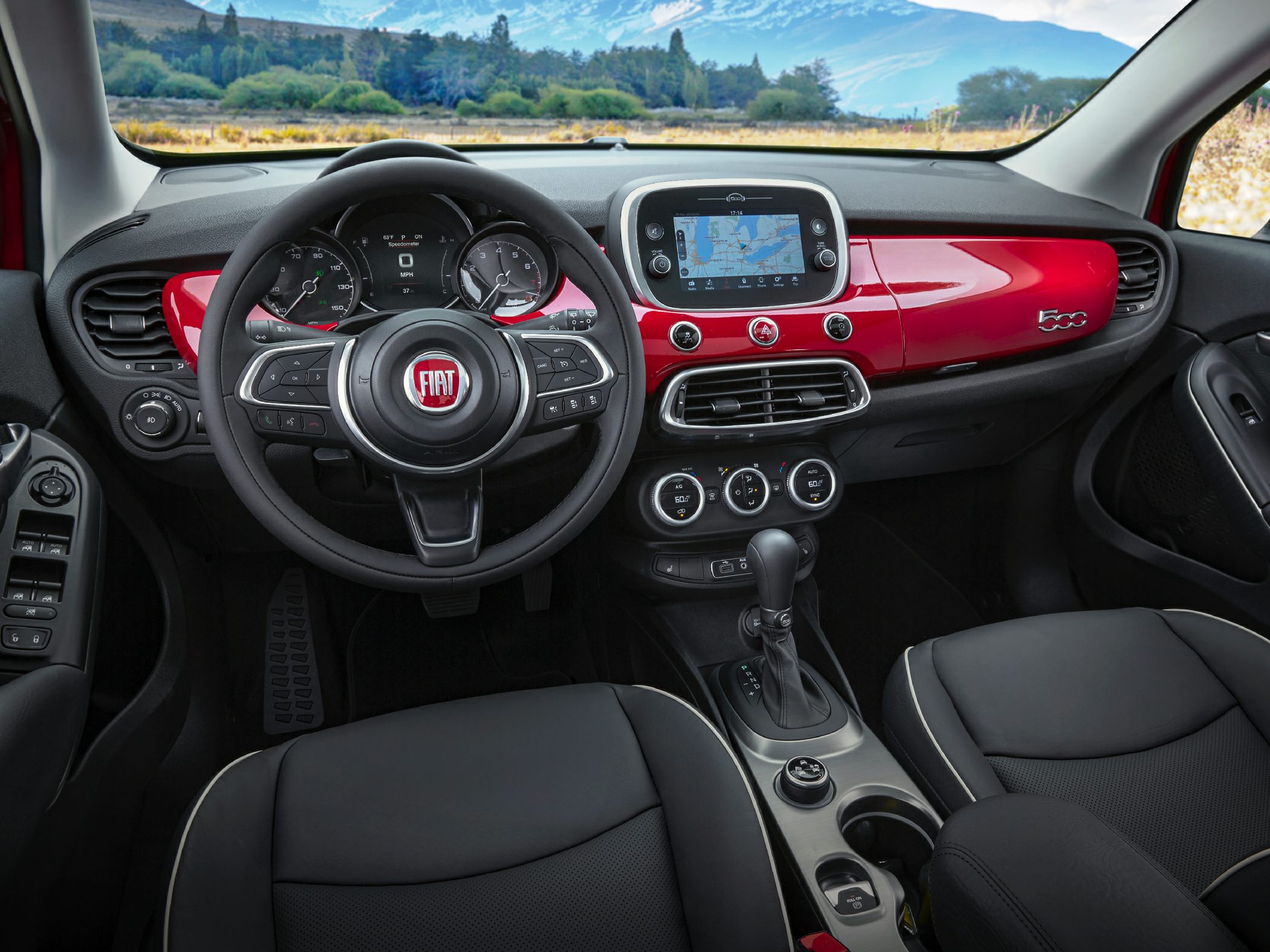Dashboard with touchscreen, multifunction steering wheel, gear shift and climate controls