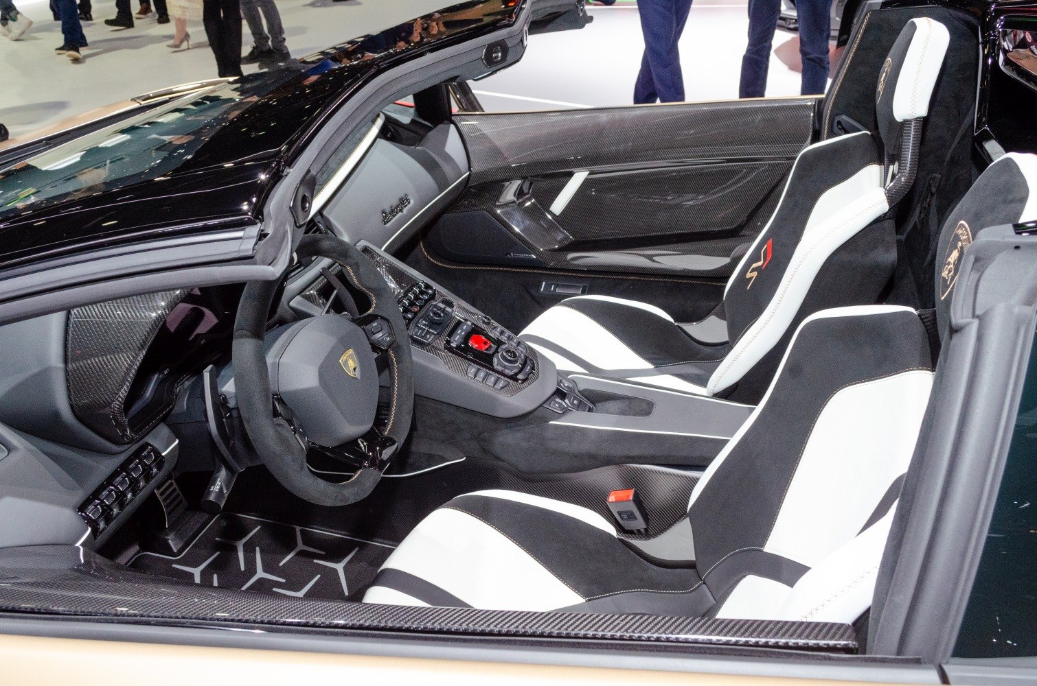 Luxury sports car interior with carbon fiber and racing seats