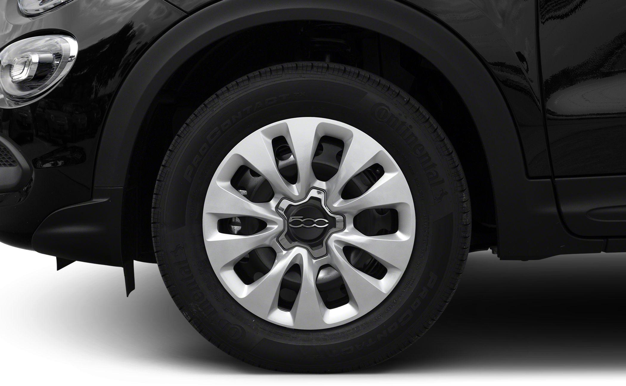 Close-up of alloy wheel with multi-spoke design and black front fender