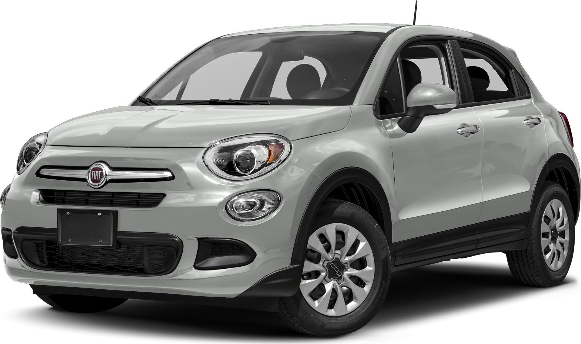 Front side view of compact SUV with rounded headlights and distinctive grille